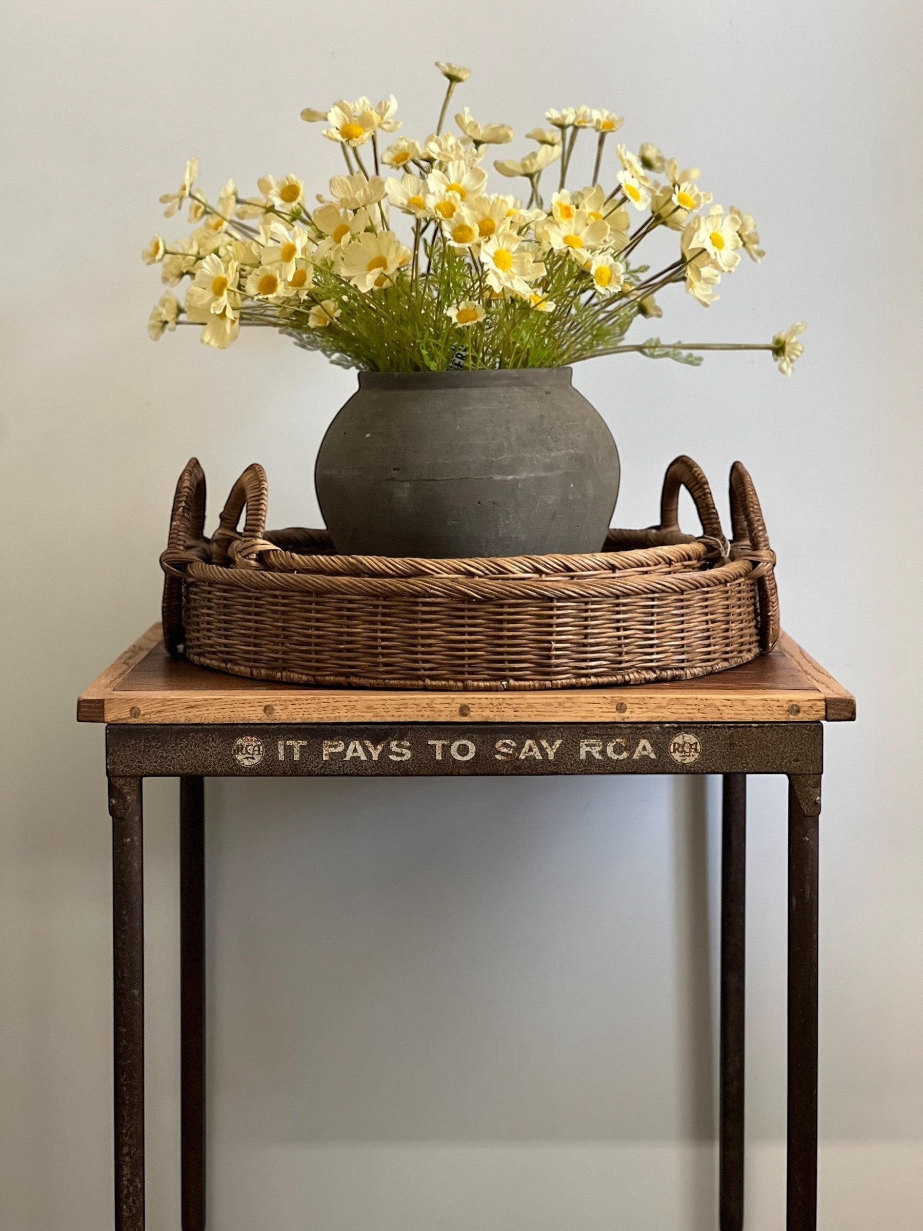 Homestyle Collective buttermilk yellow artificial cosmos flowers in a dark grey vase, bundled in 3 stems.