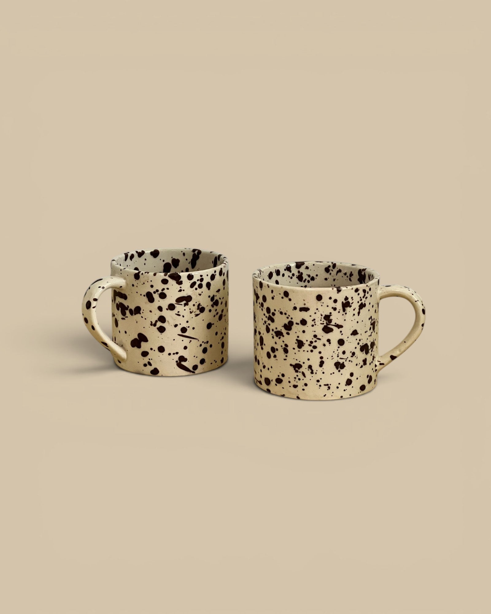 Homestyle Collective set of 2 cacao brown splatterware stoneware mugs, handmade with a painterly glaze.