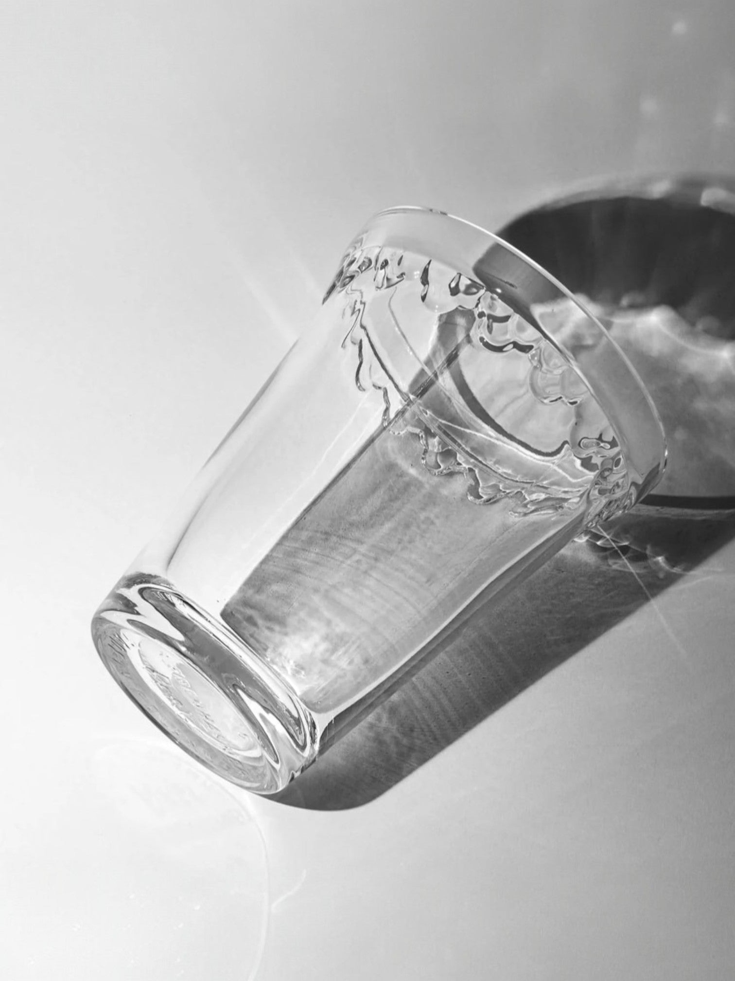 Homestyle Collective clear glass vase with decorative rim, 15cm height, perfect for flowers or as a decorative piece.