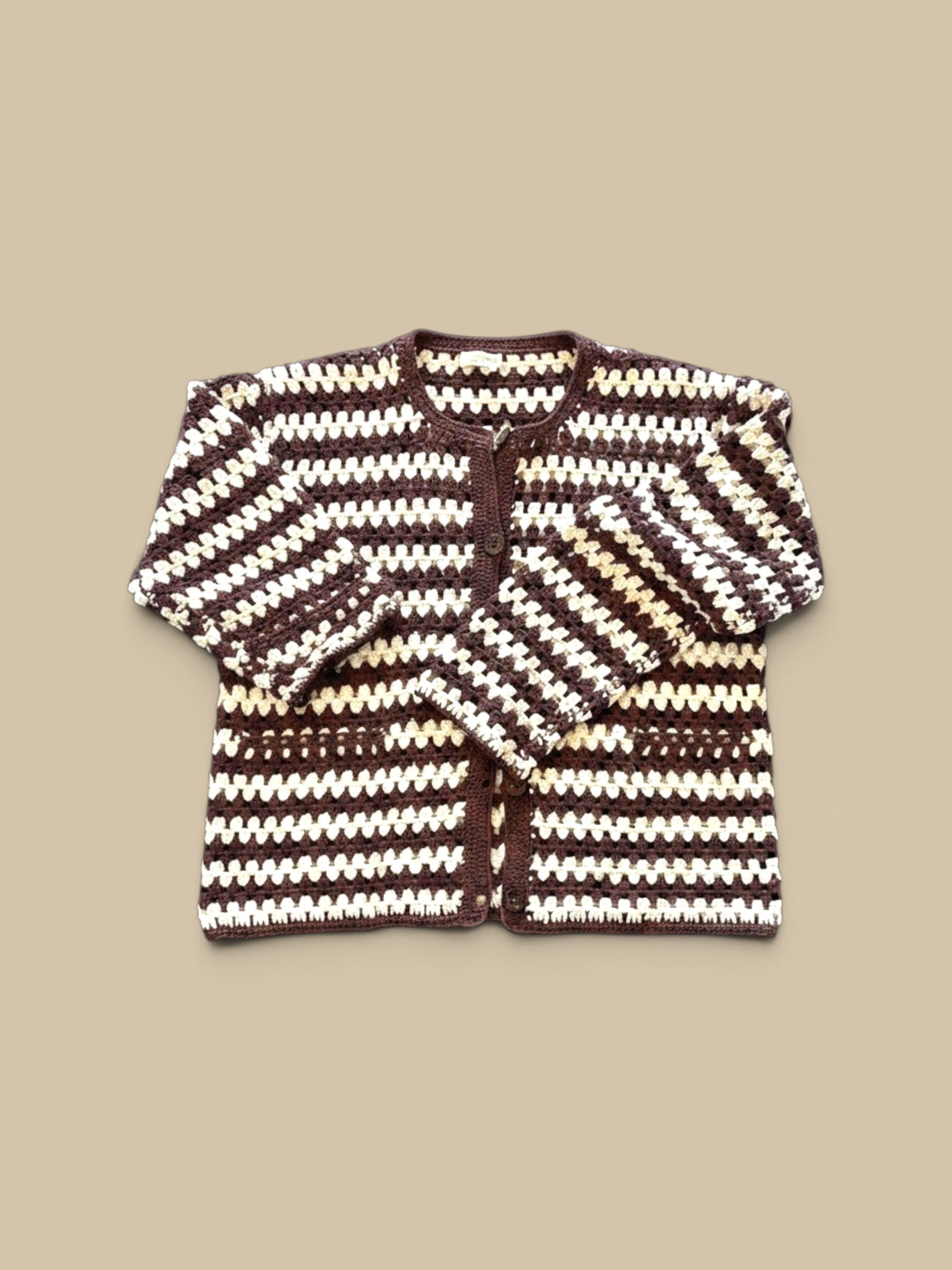Homestyle Collective Coco/Ecru hand-knit 100% cotton crochet cardigan with button front and granny square pattern.