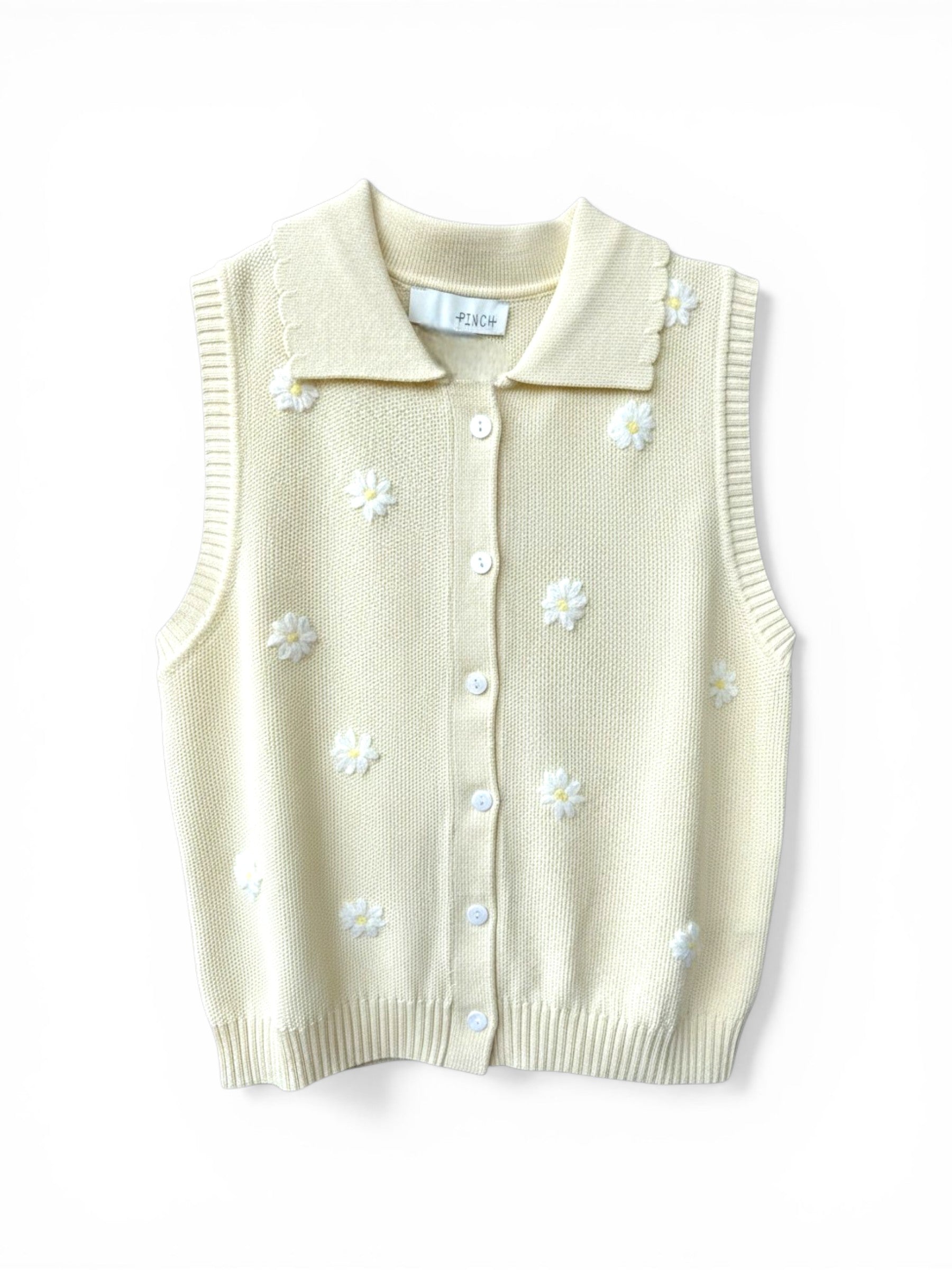 Homestyle Collective cream knit vest with floral embroidery and a collared neckline.