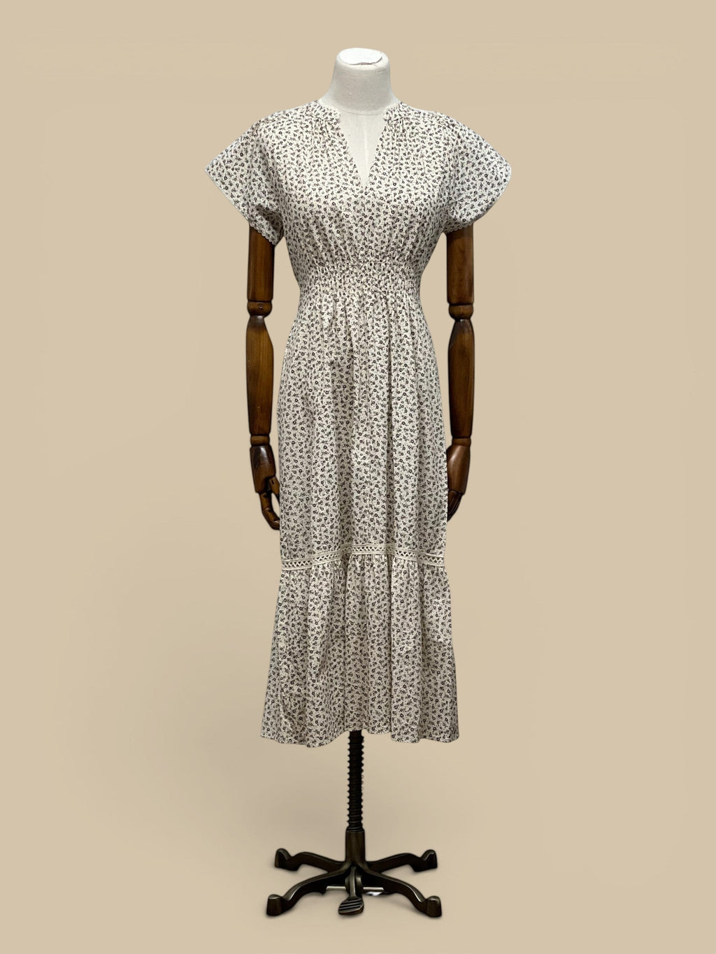 Homestyle Collective brown & ivory ditzy floral print cotton midi dress with smocked waist and scallop lace trim.