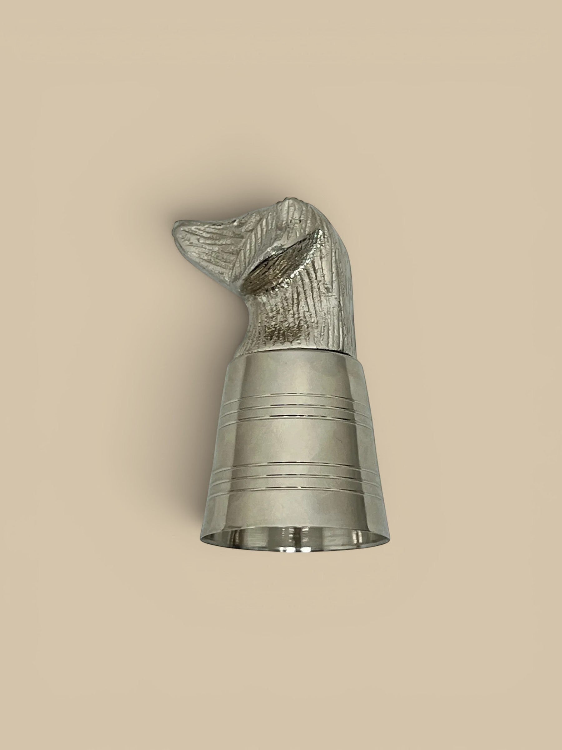 Homestyle Collective Guardian dog head shot glass, silver cast aluminum and stainless steel.