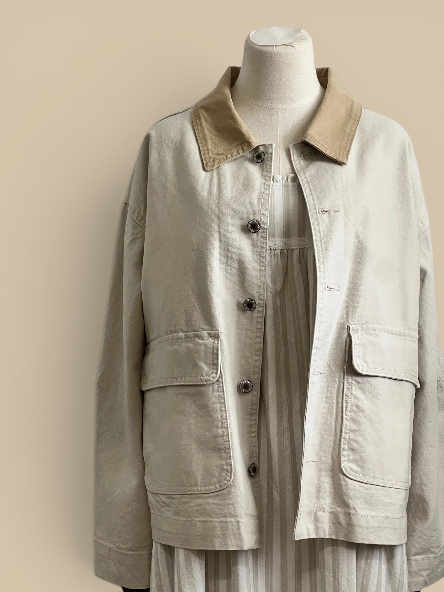 Homestyle Collective ecru cotton barn jacket with contrast collar and button front. Slightly oversized fit.