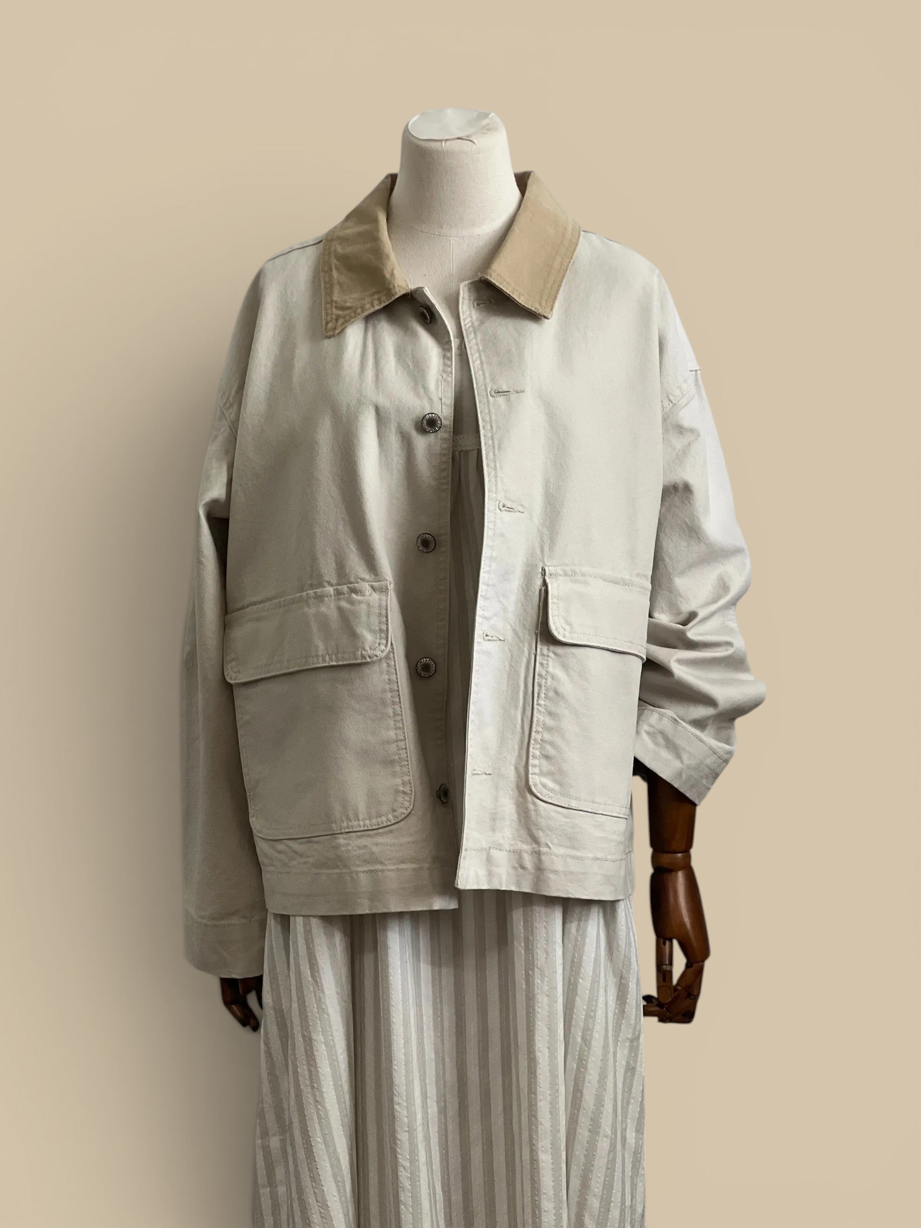 Homestyle Collective ecru cotton barn jacket with contrast collar and oversized fit.