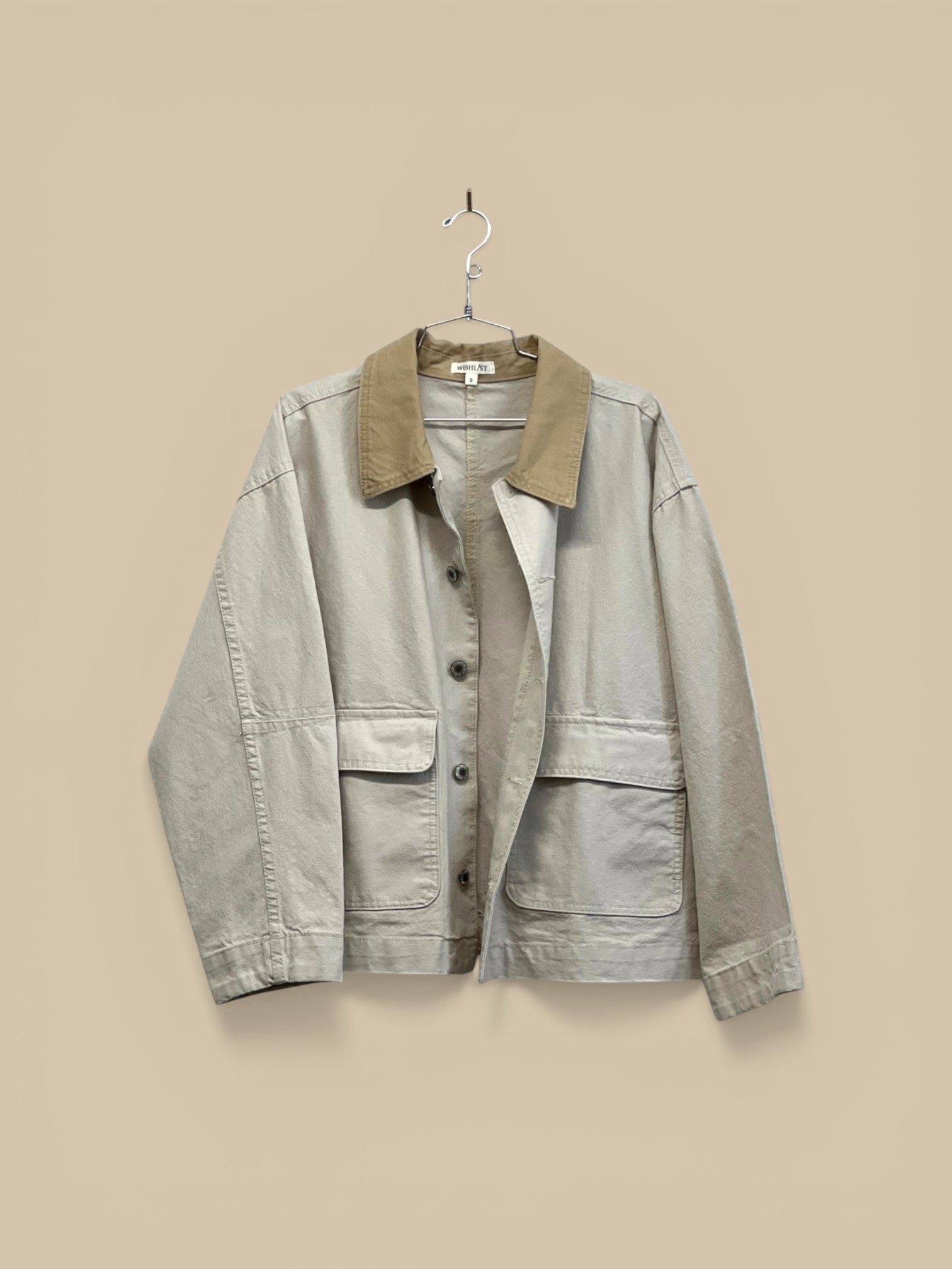 Homestyle Collective ecru 100% cotton barn jacket with contrast collar and button front.