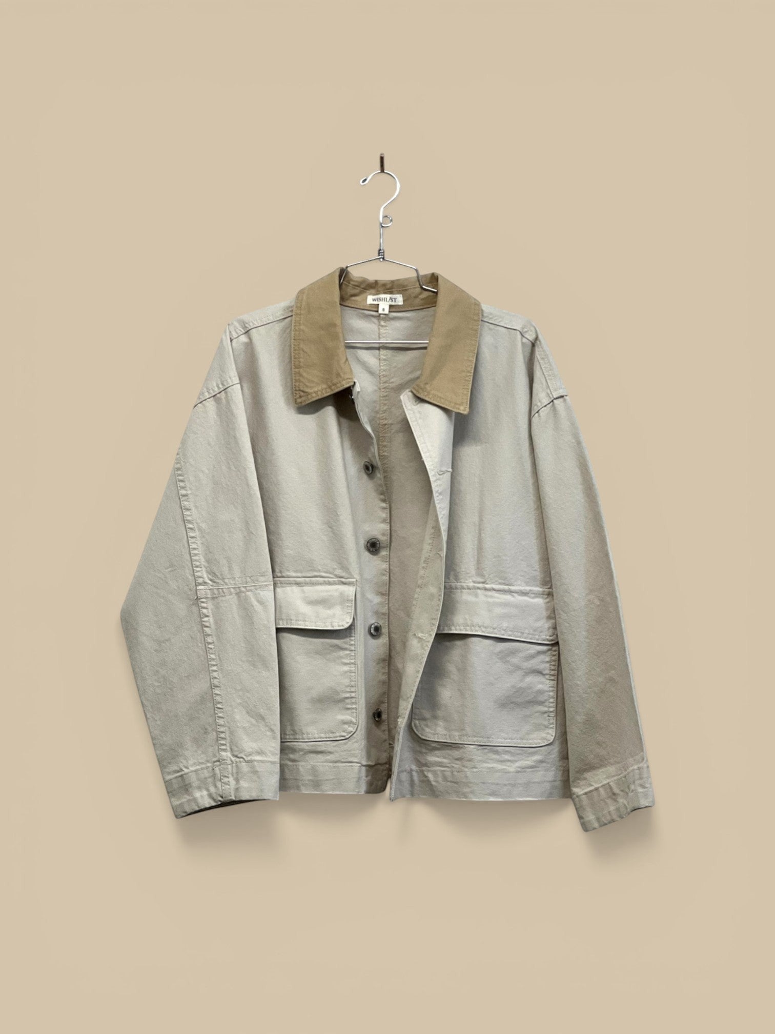 Homestyle Collective ecru 100% cotton barn jacket with contrast collar and button front.