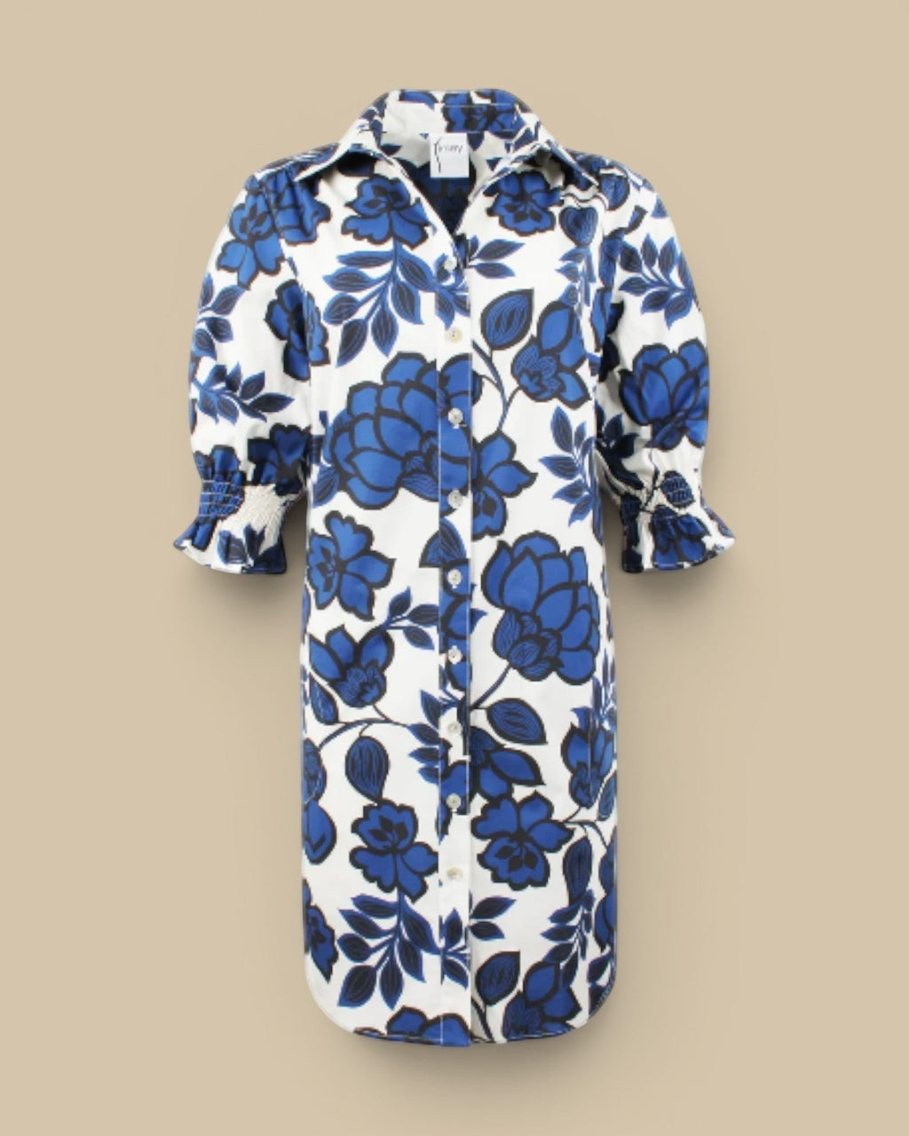 Homestyle Collective Finley Miller navy, white, and black floral print cotton blend shirt dress with puff sleeves and button front.