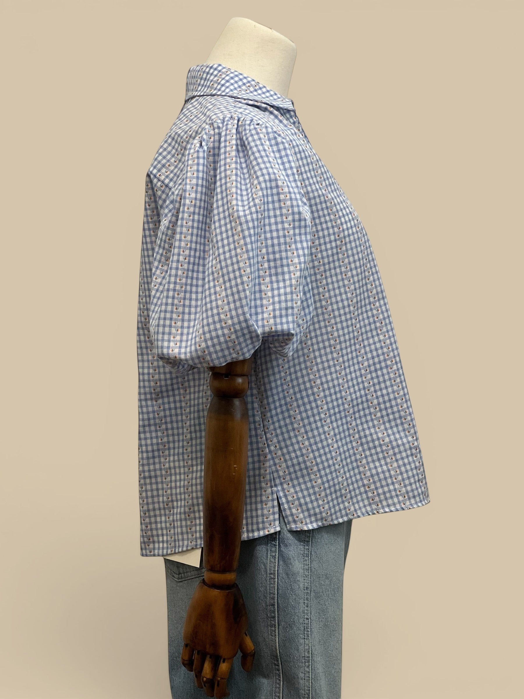 Homestyle Collective blue and white floral gingham short sleeve blouse with puff sleeves and collar.