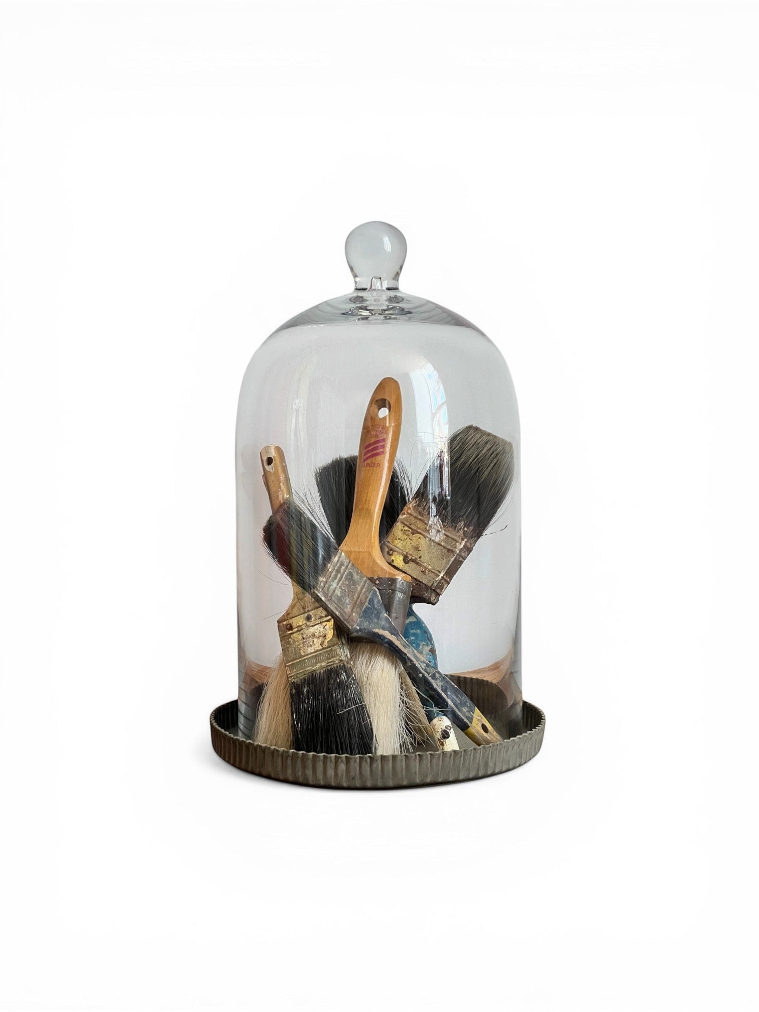 Homestyle Collective clear glass dome cloche with fluted metal base, ideal for display or terrariums.