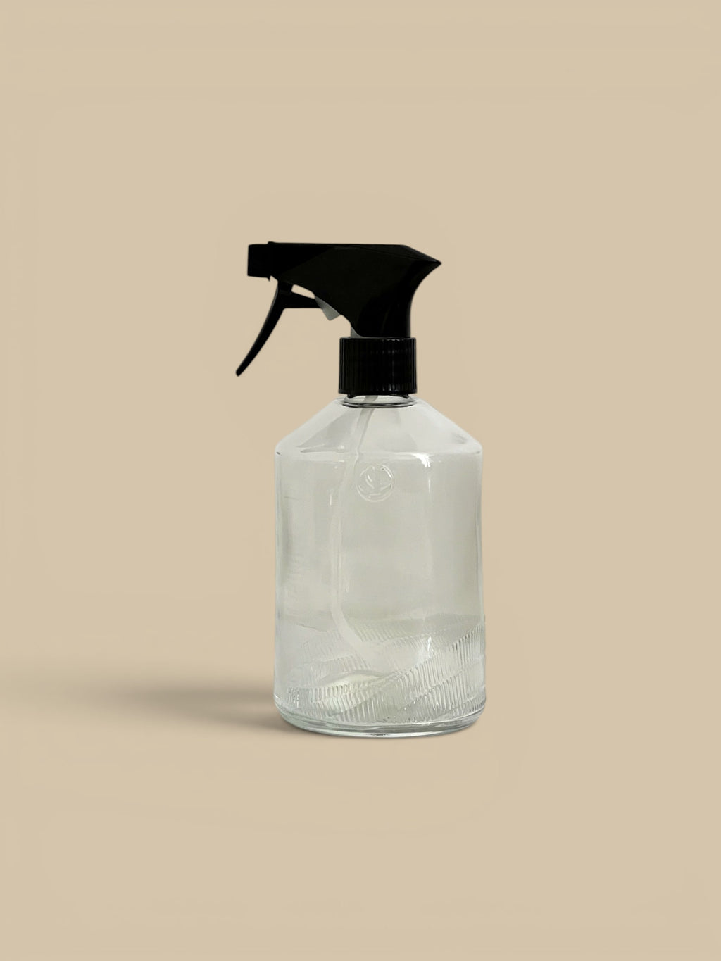 Homestyle Collective clear glass multipurpose spray bottle with black trigger sprayer and a box of L'AVANT cleaner refills.