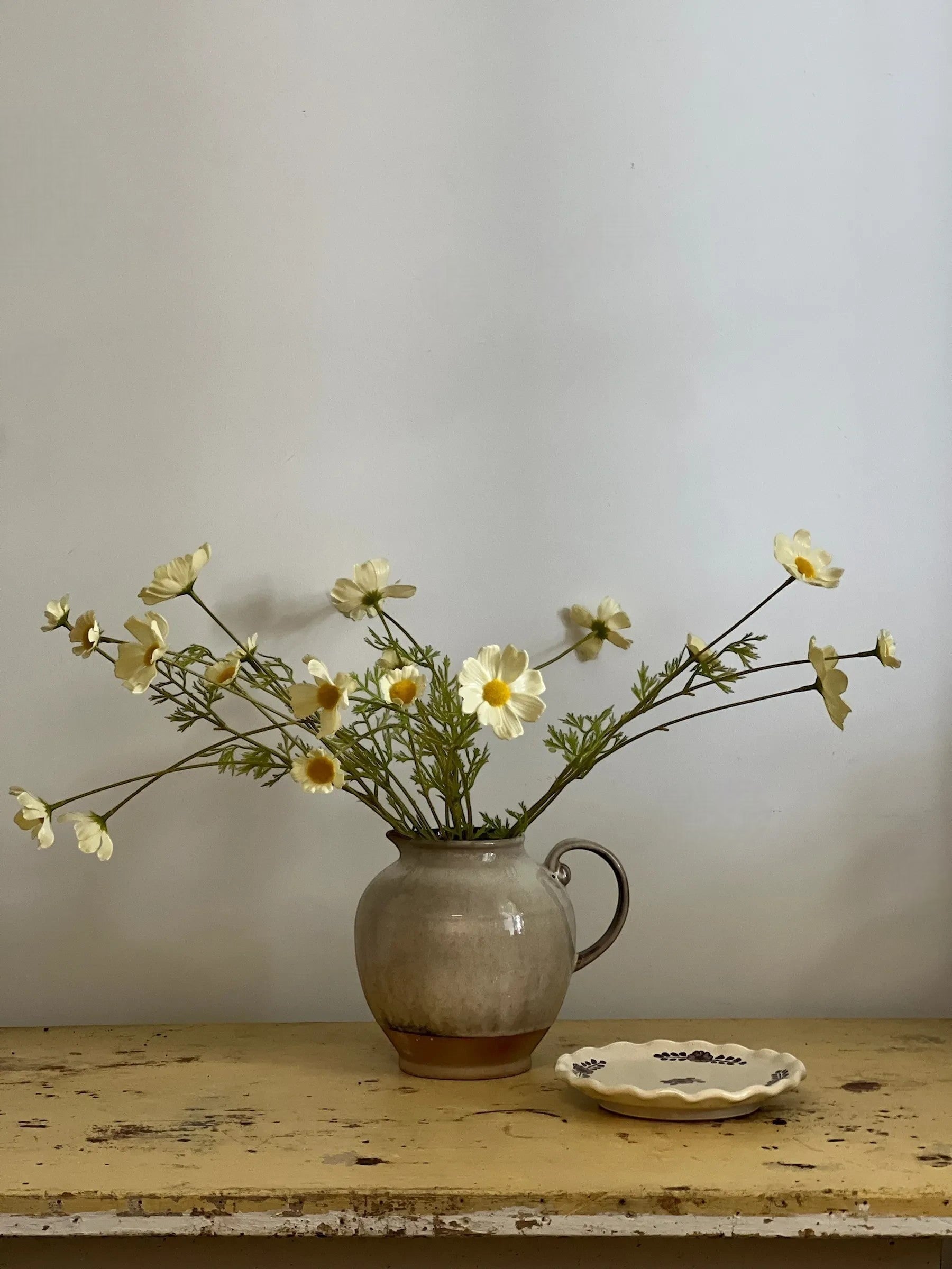 Homestyle Collective Glaze Shift Pitcher, a 72 oz stoneware pitcher with a reactive multicolor glaze and a unique, artful design.