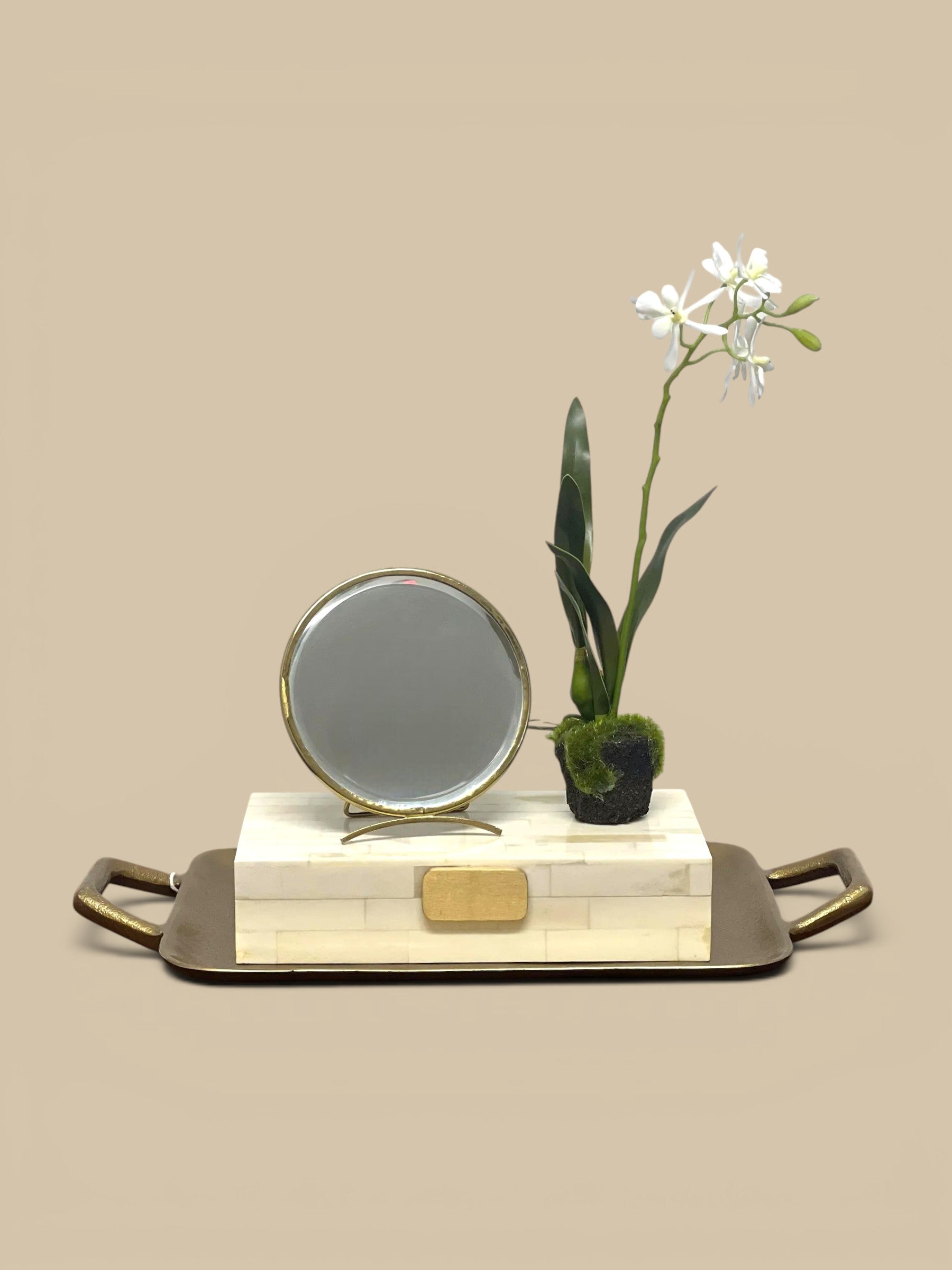 Homestyle Collective golden arc folding mirror with brass frame and adjustable metal base. Decorative vanity accessory.