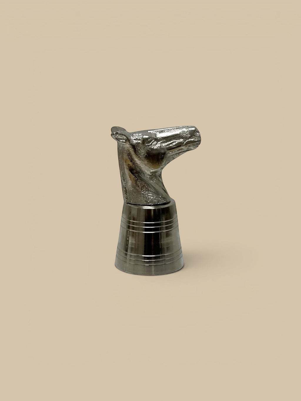 Homestyle Collective silver horse head shot glass with stainless steel body and ribbed detail.