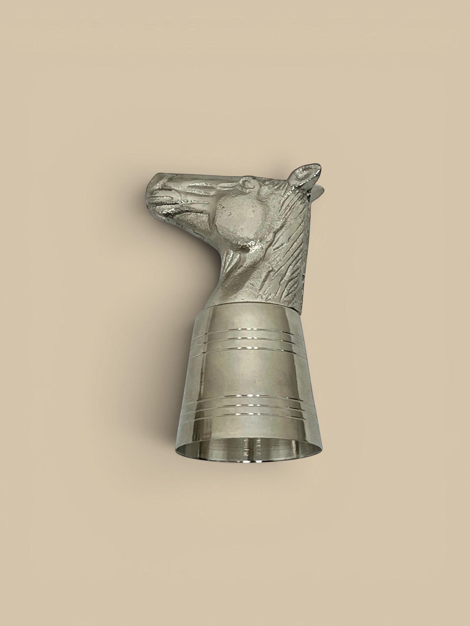 Homestyle Collective silver horse head shot glass with stainless steel body and decorative bands.