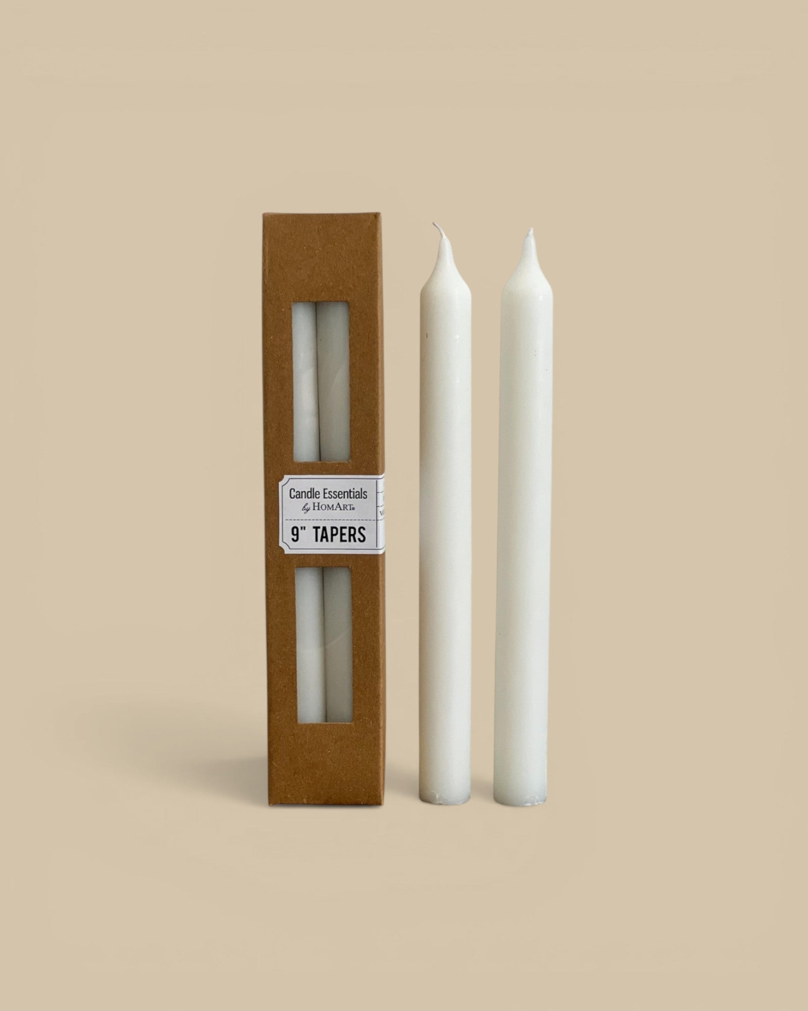 Homestyle Collective 9" ivory taper candles, unscented paraffin and palm wax blend with cotton wick, sold in a box of 4.