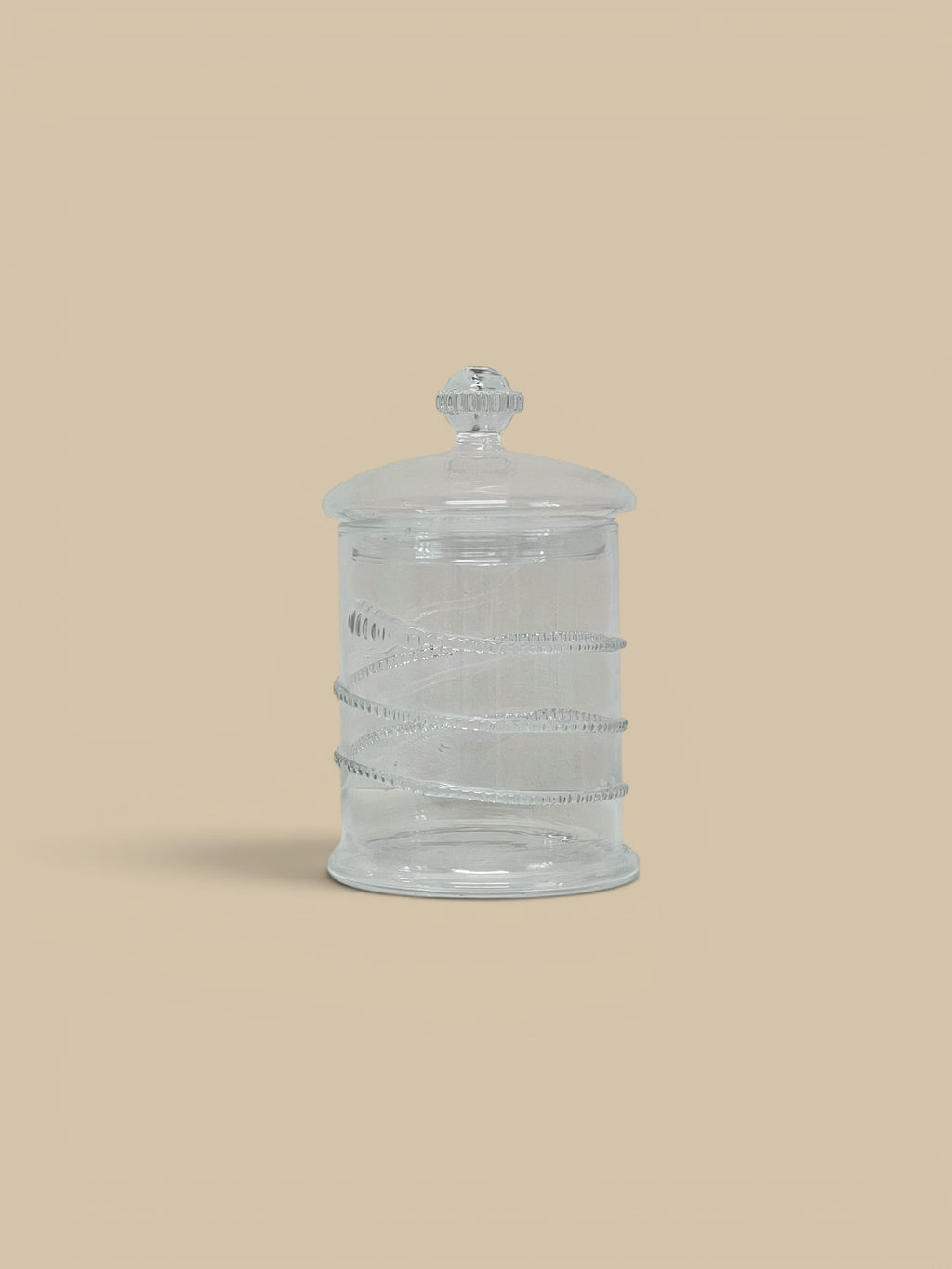 Homestyle Collective Juliet clear glass lidded jars, set of 2, with decorative embossed bands and finial lids.