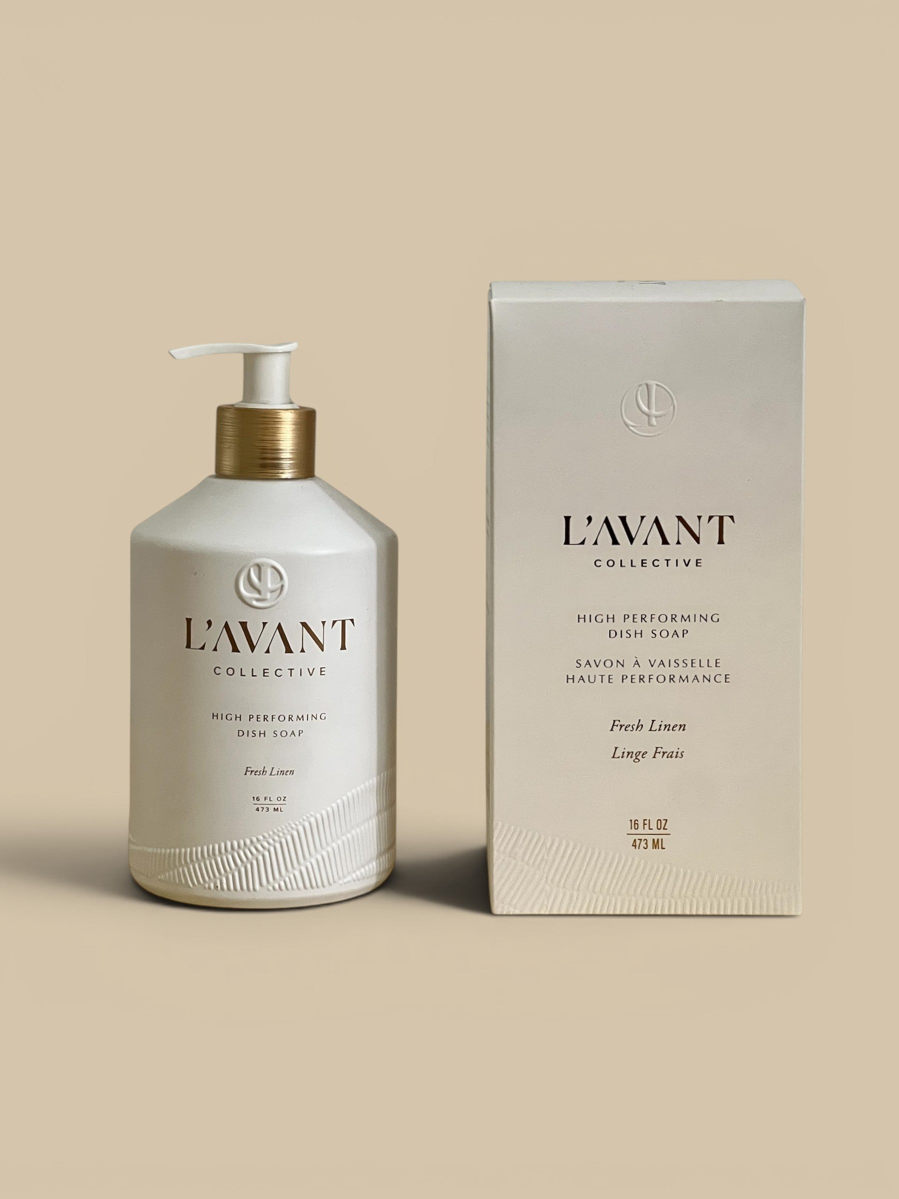 Homestyle Collective L'avant Collective matte white glass dish soap bottle with gold pump and Fresh Linen scent.