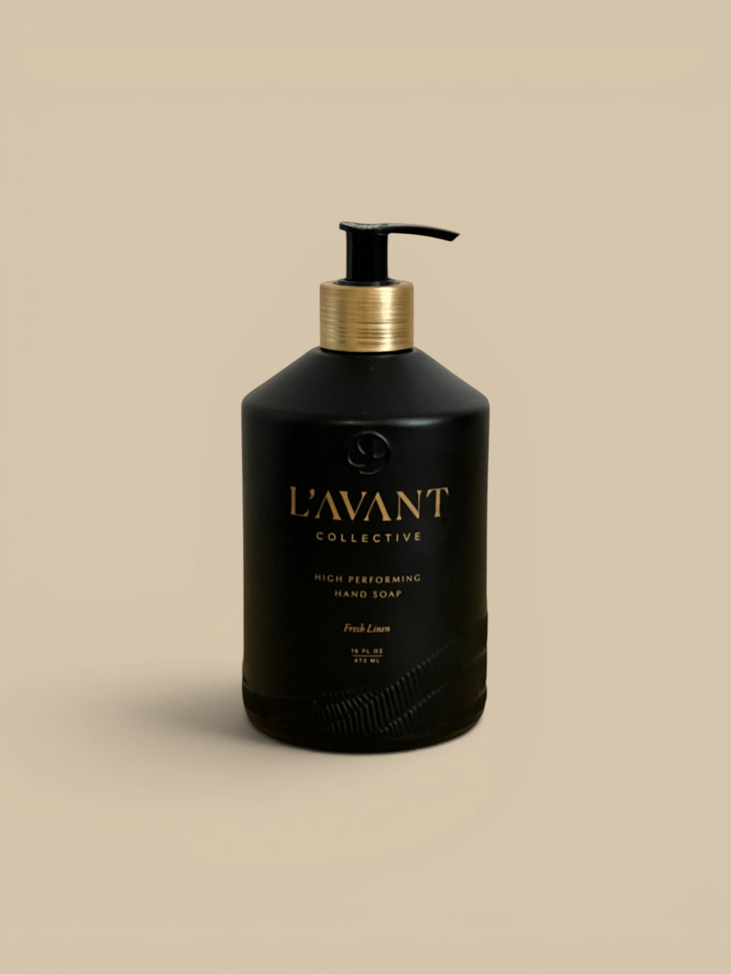 Homestyle Collective L'AVANT Collective black glass hand soap bottle with gold pump, Fresh Linen scent.