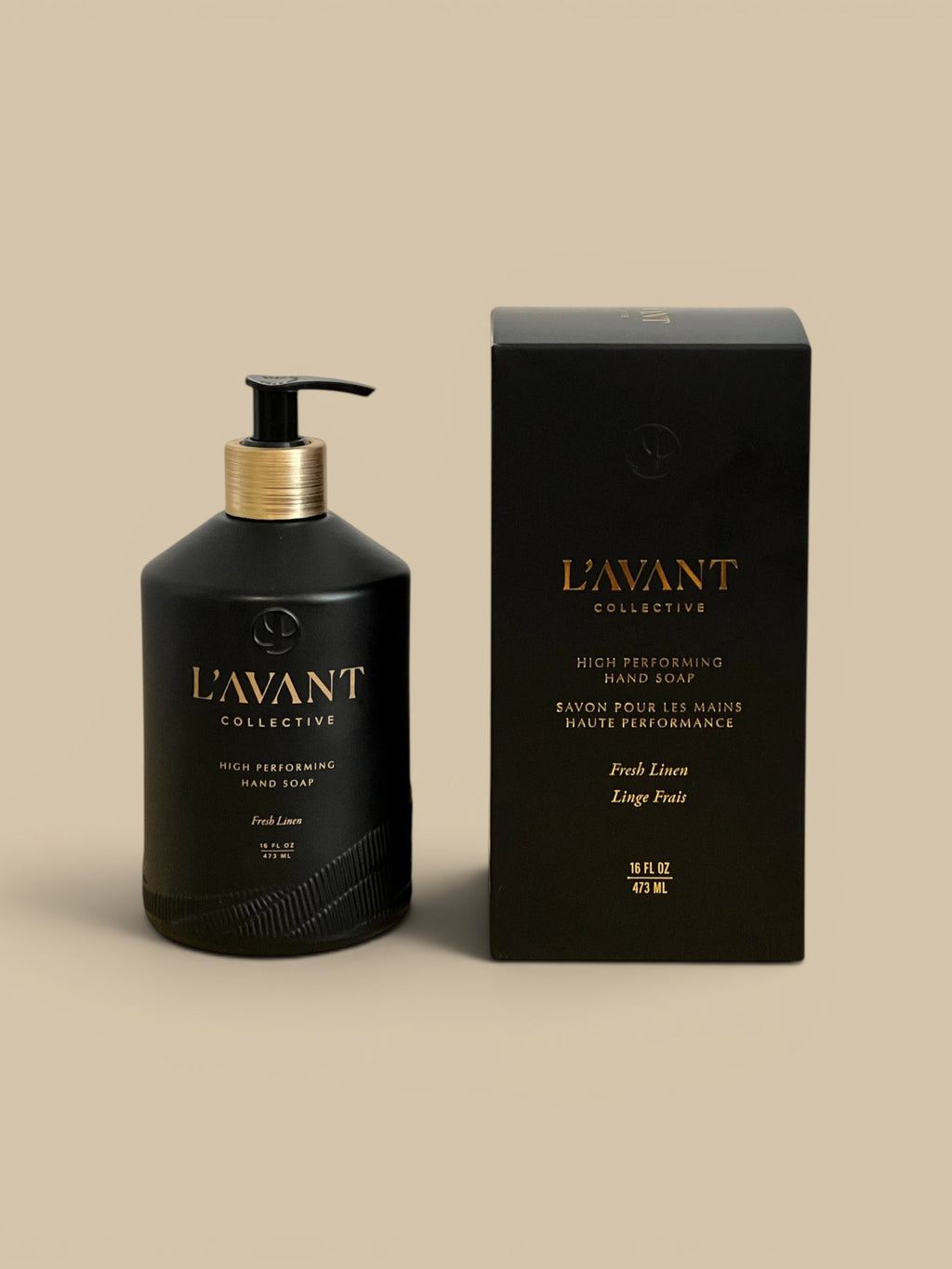 Homestyle Collective L'AVANT Collective black glass hand soap bottle with gold pump and Fresh Linen scent.