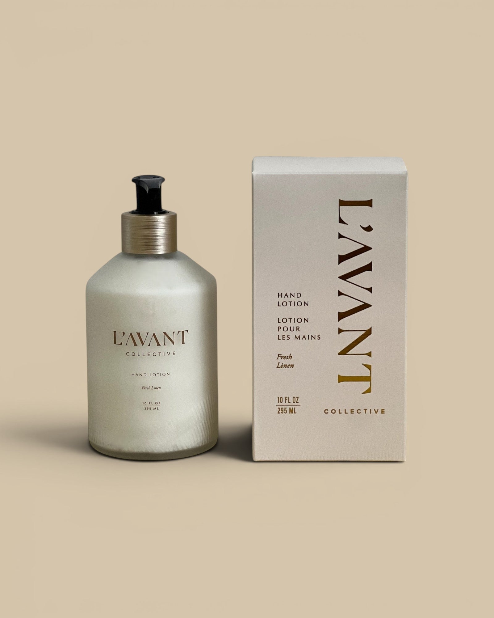 Homestyle Collective L'AVANT Hand Lotion in Fresh Linen scent, 10 fl oz glass bottle with pump and box.