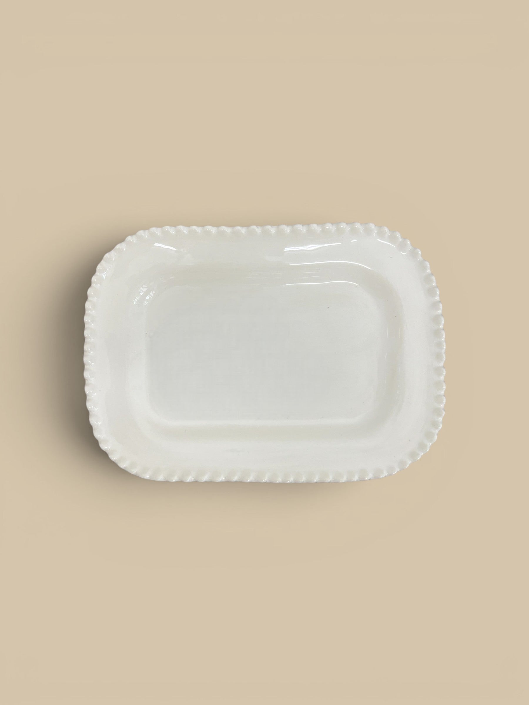 Homestyle Collective Mabel white ceramic serving tray with beaded edge detail, perfect for canapés or display.