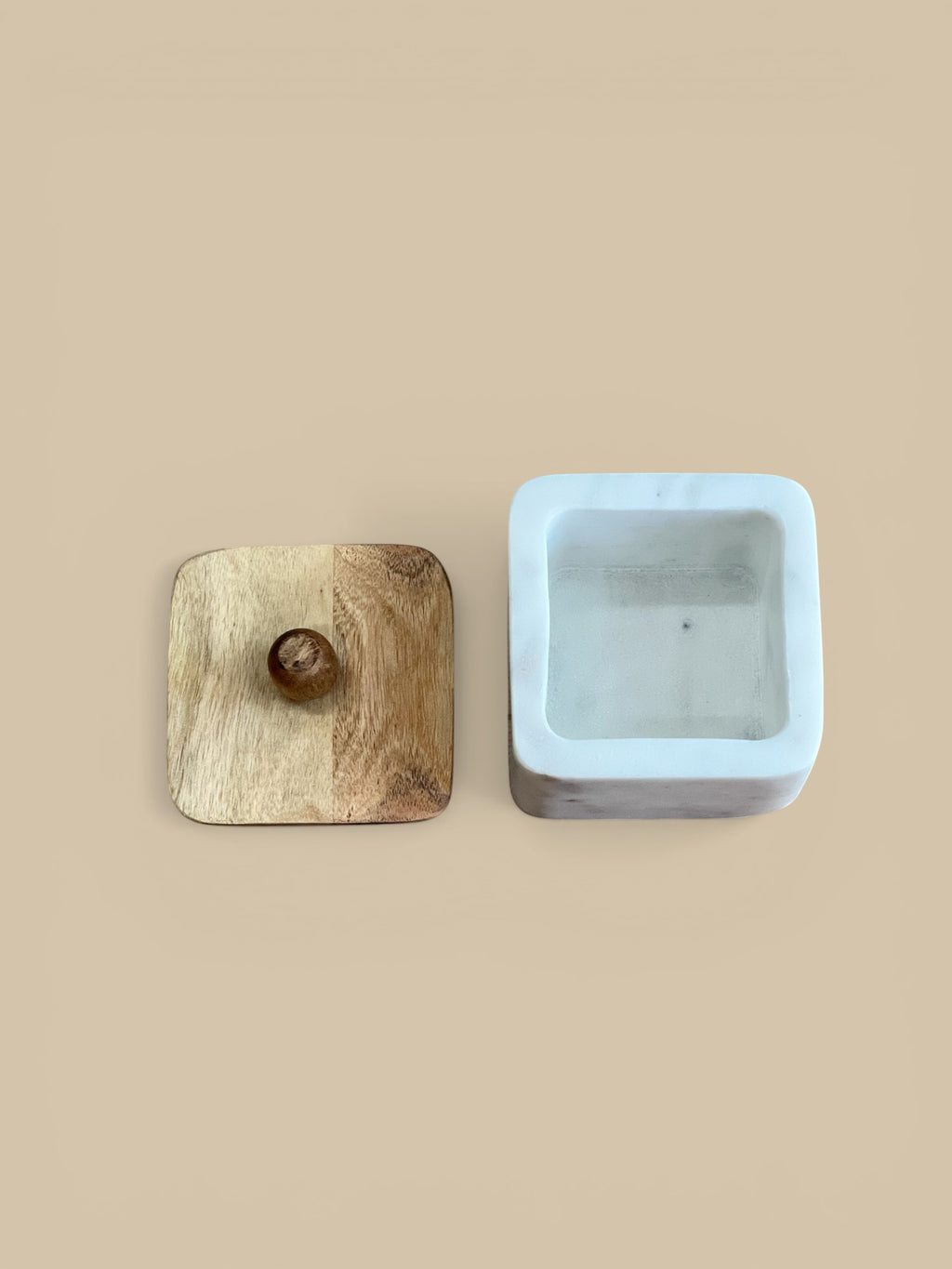 Homestyle Collective white marble square container with acacia wood lid, ideal for spices or jewelry.