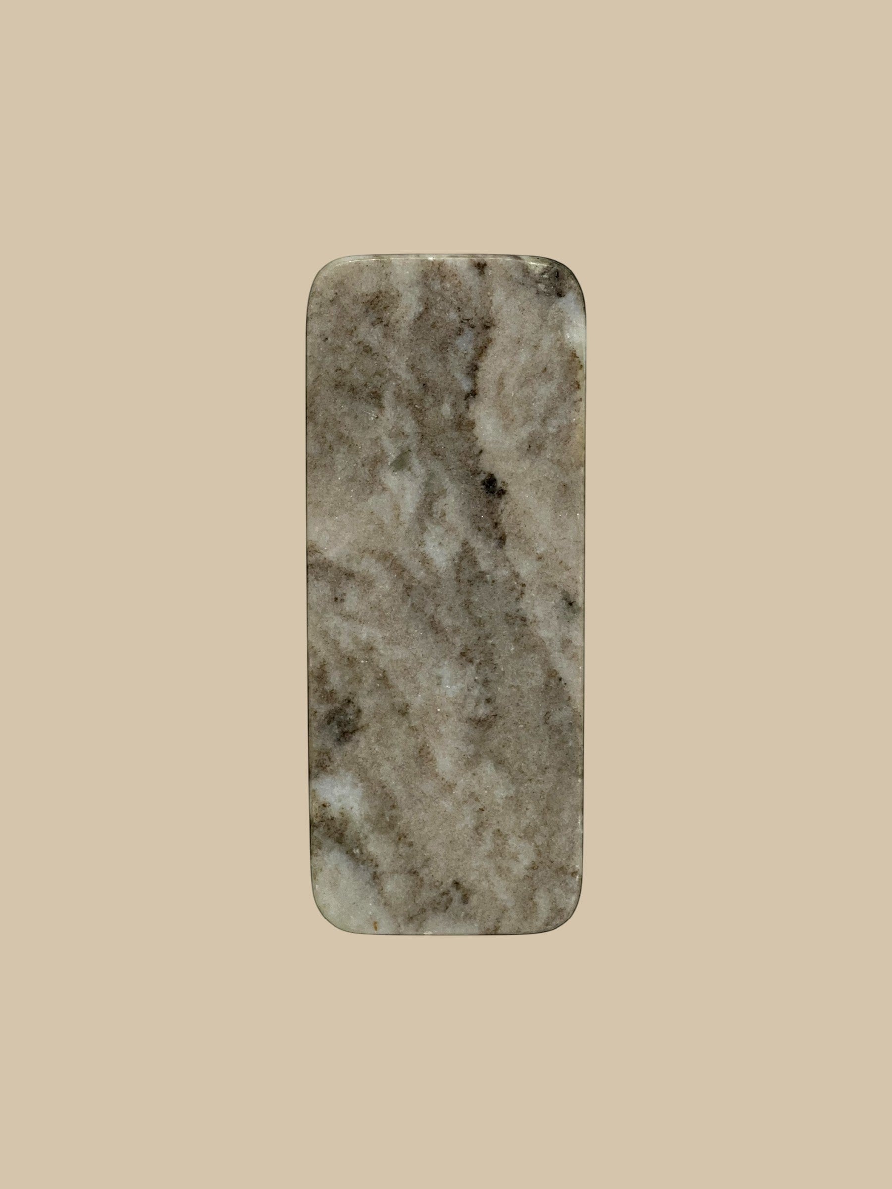 Homestyle Collective rectangular marble serving board with natural grey veining and rounded corners.