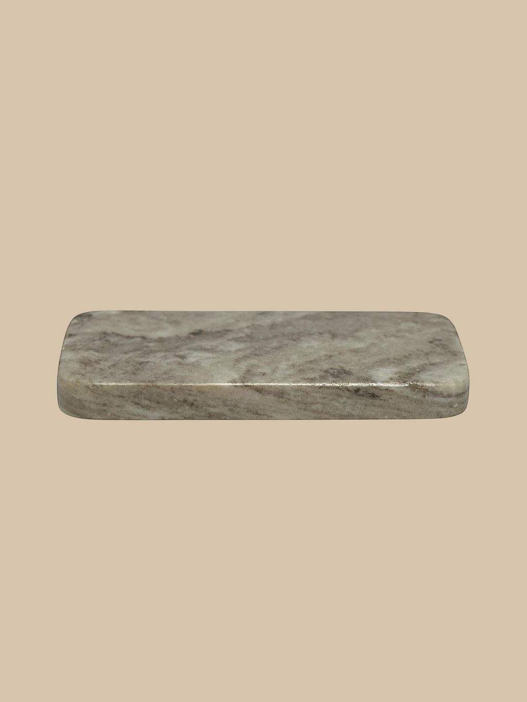 Homestyle Collective rectangular marble serving board with grey veining, 10" L x 4" W x 1" H.
