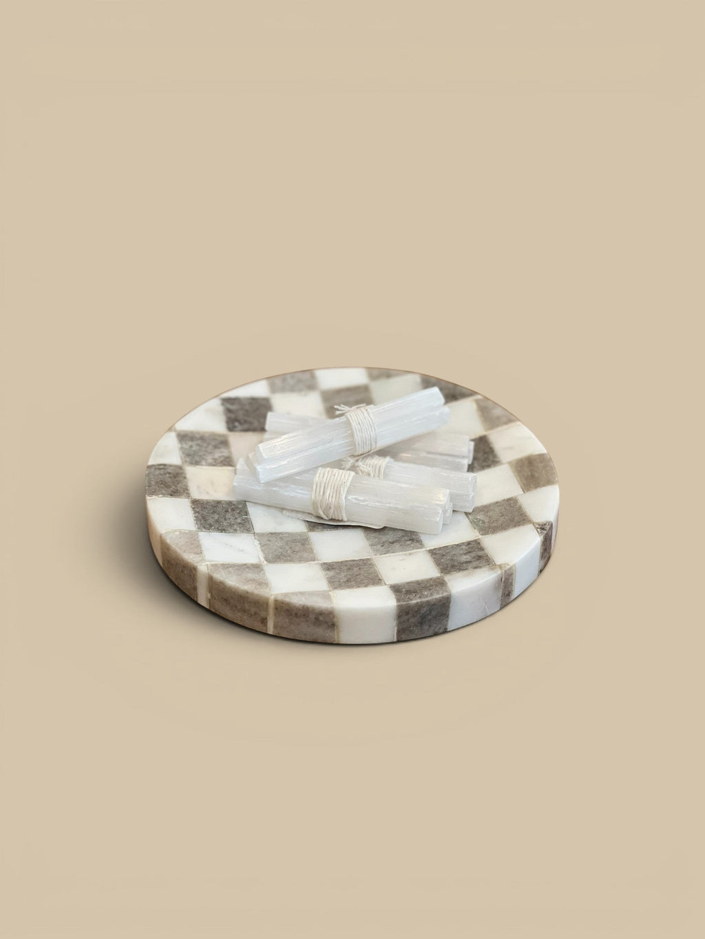 Homestyle Collective Gridstone Marble Tray with checkered pattern in buff and white squares, 8" round.