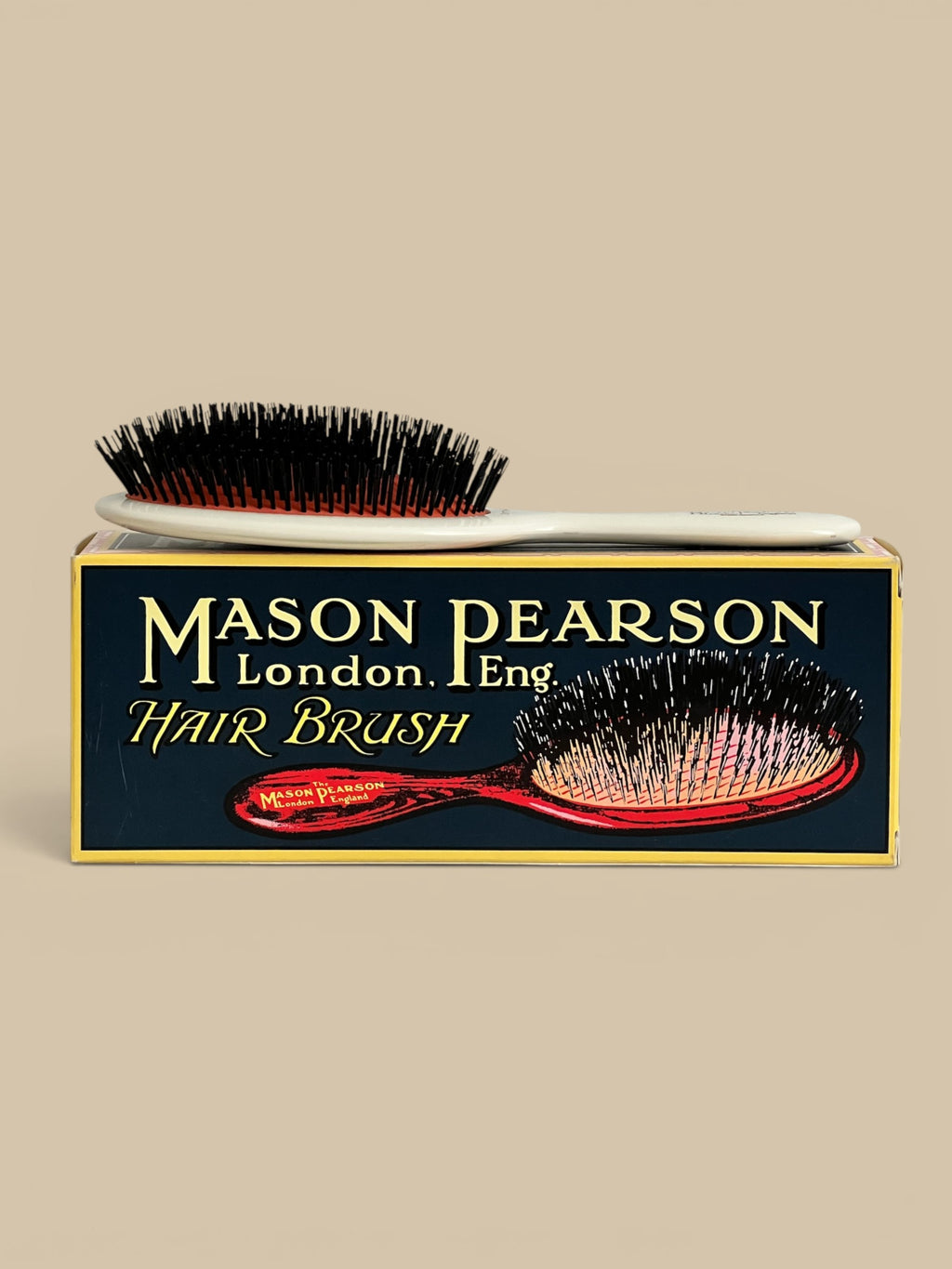 Homestyle Collective Mason Pearson Small Extra Boar Bristle Hairbrush with white handle and black bristles.