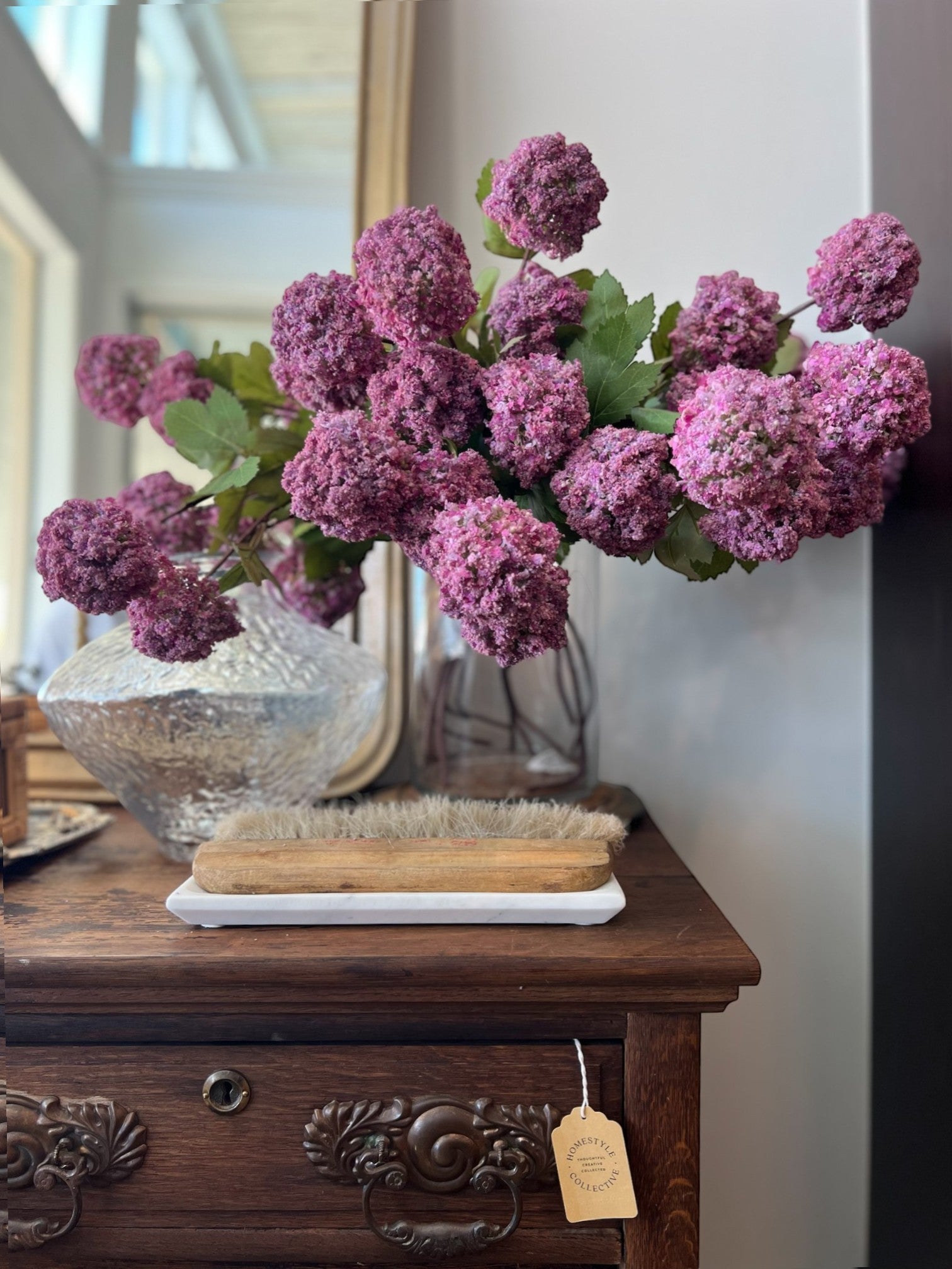 Homestyle Collective artificial mauve guelder rose stem with abundant flower heads and green leaves.