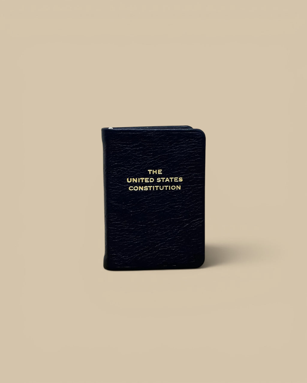 Homestyle Collective mini United States Constitution book in navy full-grain leather with gold embossed lettering