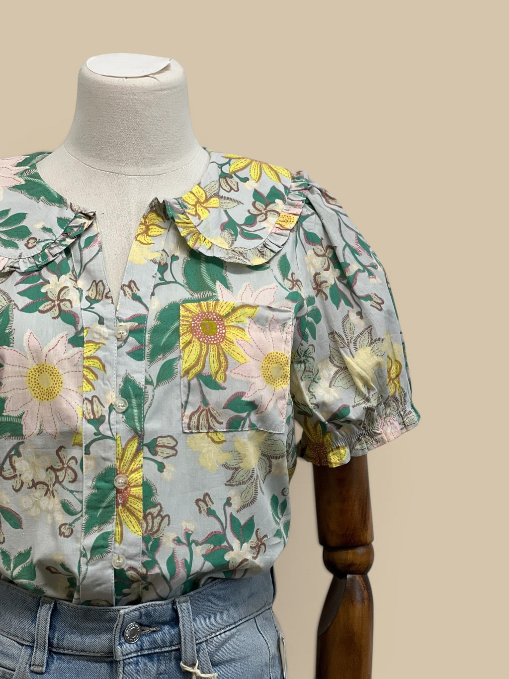 Homestyle Collective mint floral print short sleeve blouse with doll collar and puff sleeves.