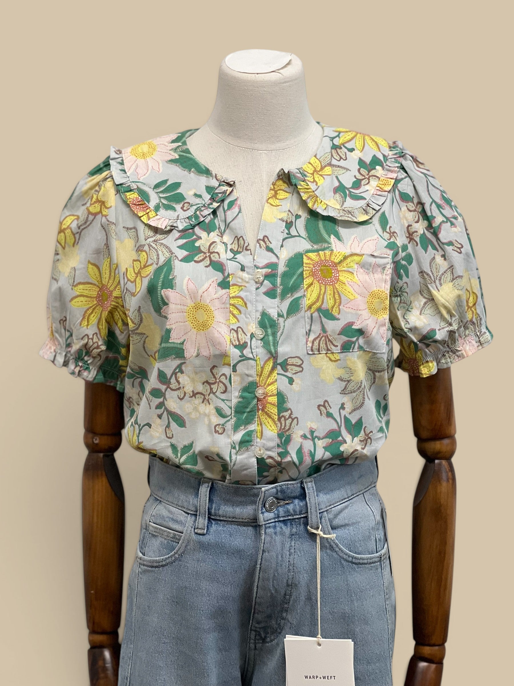 Homestyle Collective mint floral print short sleeve blouse with doll collar and puff sleeves.