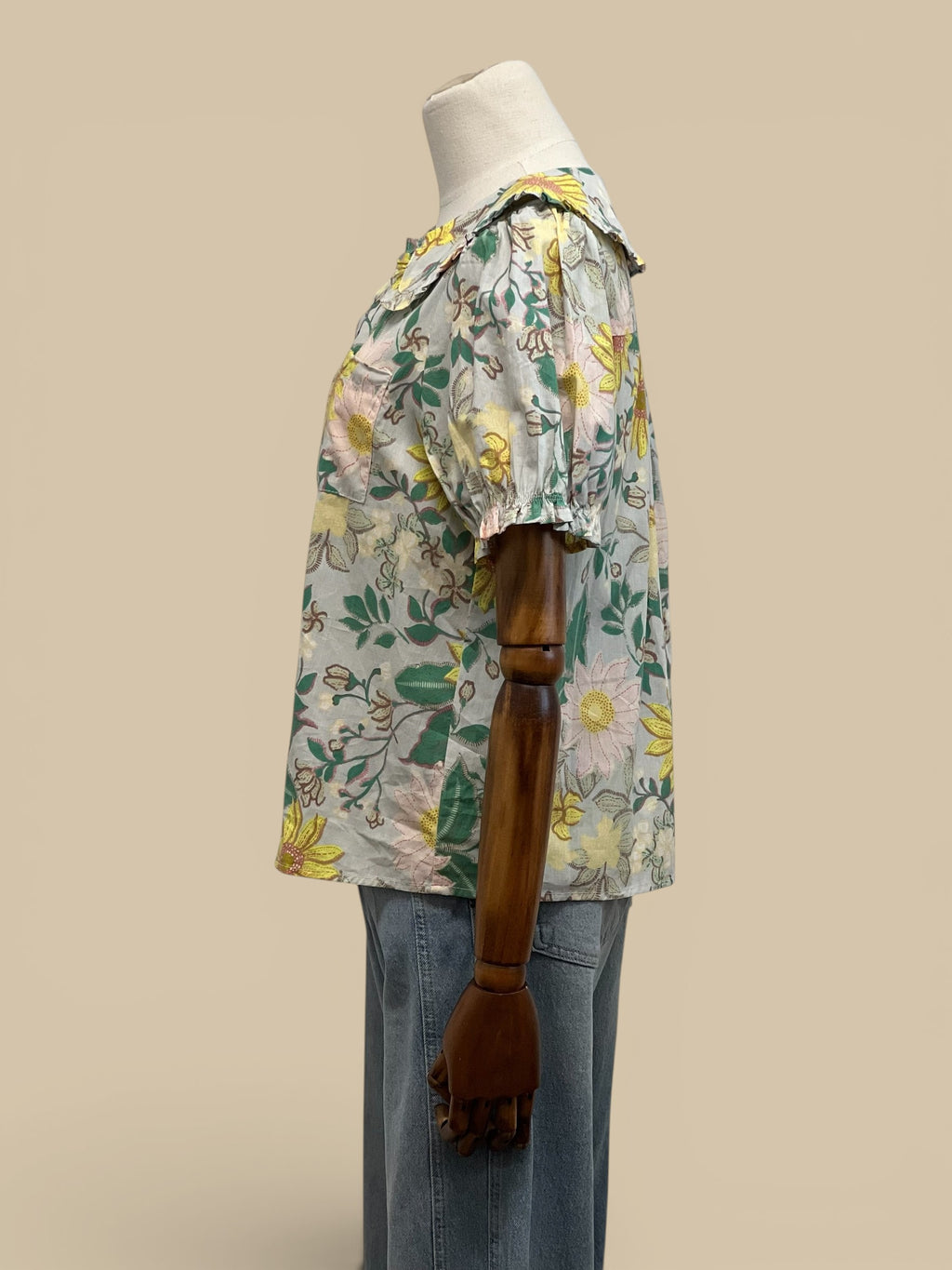 Homestyle Collective mint floral print short sleeve blouse with doll collar and puff sleeves.
