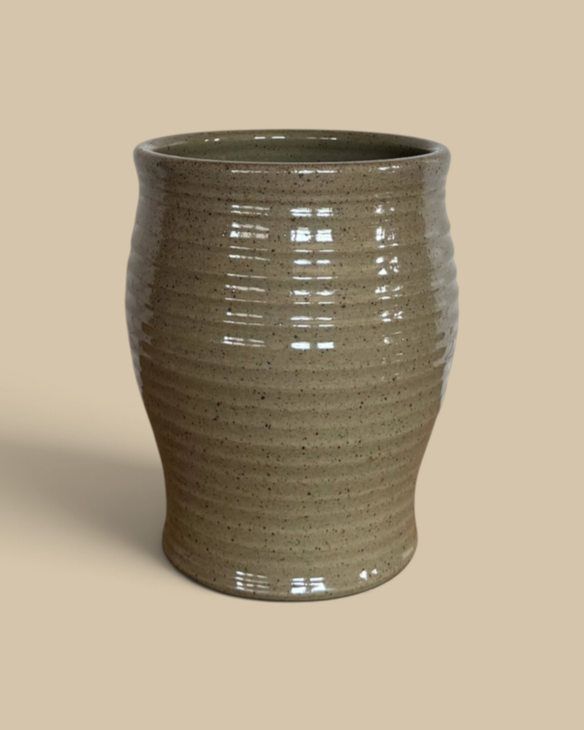 Homestyle Collective Ridges Utensil Jar in mocha glaze with a handcrafted ribbed texture for kitchen storage.