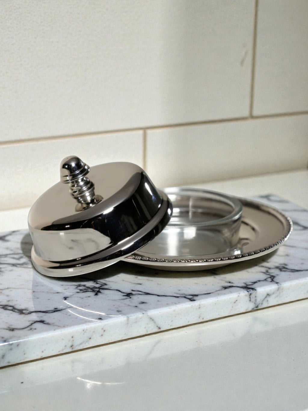 Homestyle Collective silver and glass Parisian butter dish with decorative lid knob. Perfect for serving butter.