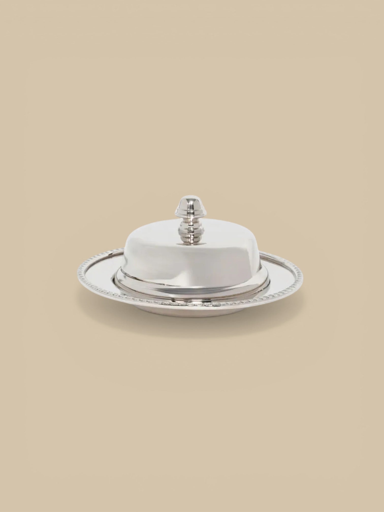 Homestyle Collective Parisian silver and glass butter dish with decorative beaded edge and knobbed lid.