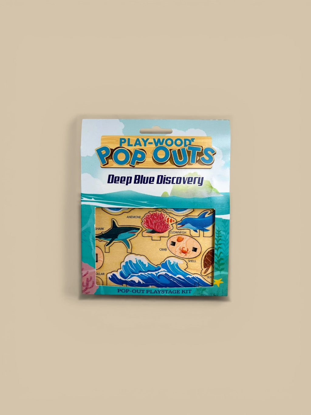 Homestyle Collective Play-Wood Pop-Outs Deep Blue Discovery kit with maple laminate pieces of sharks, dolphins, anemones, crabs, and waves.