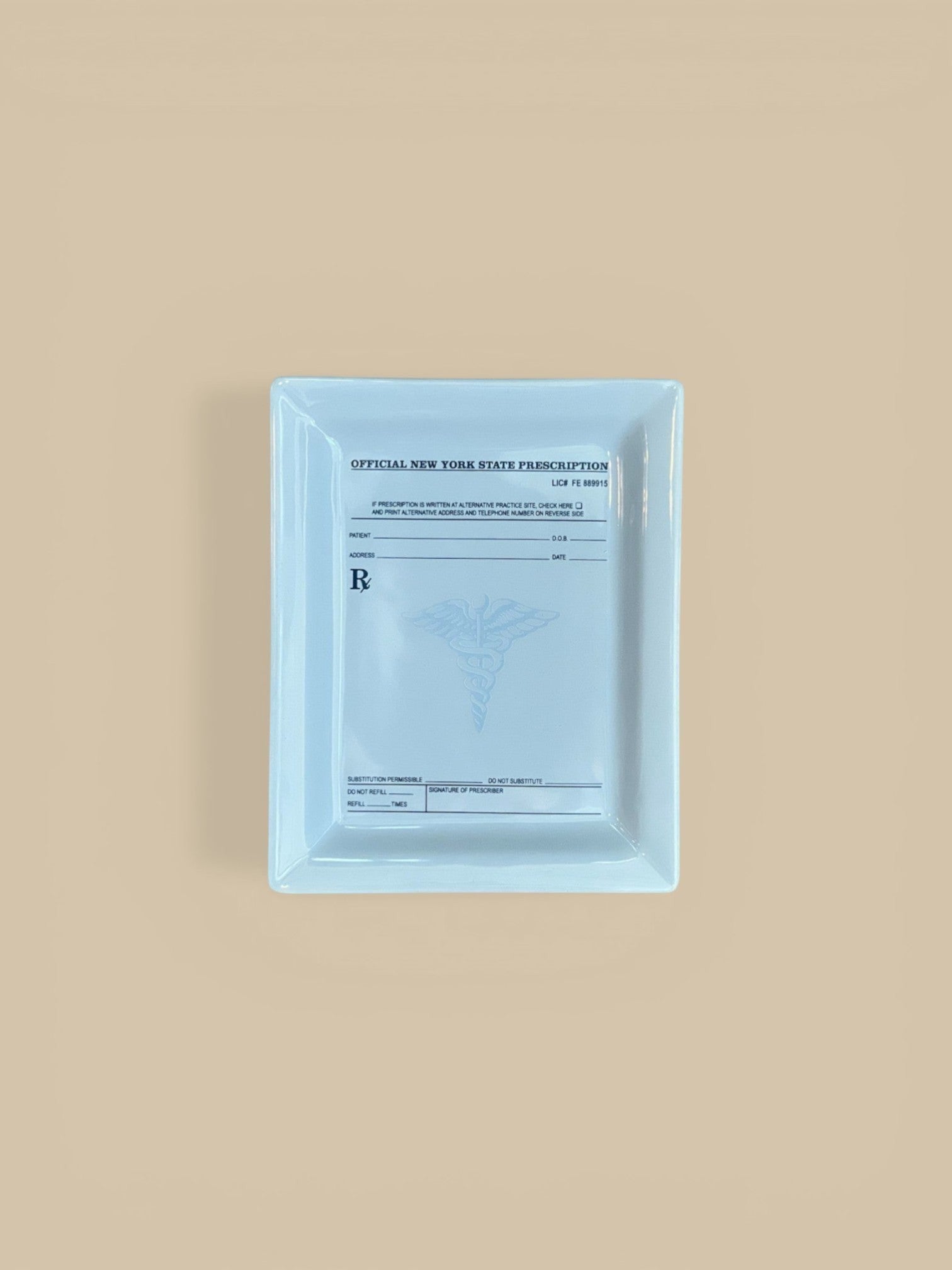 Homestyle Collective white ceramic tray designed like a New York State prescription pad, 5.5" L x 7" W.