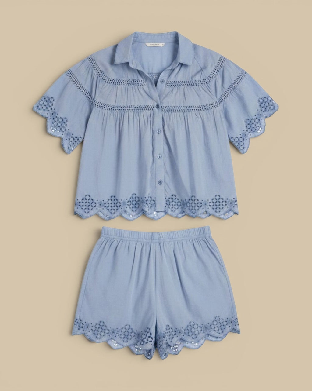 Homestyle Collective light blue cotton silk shorts with scalloped eyelet hem and elastic waistband.
