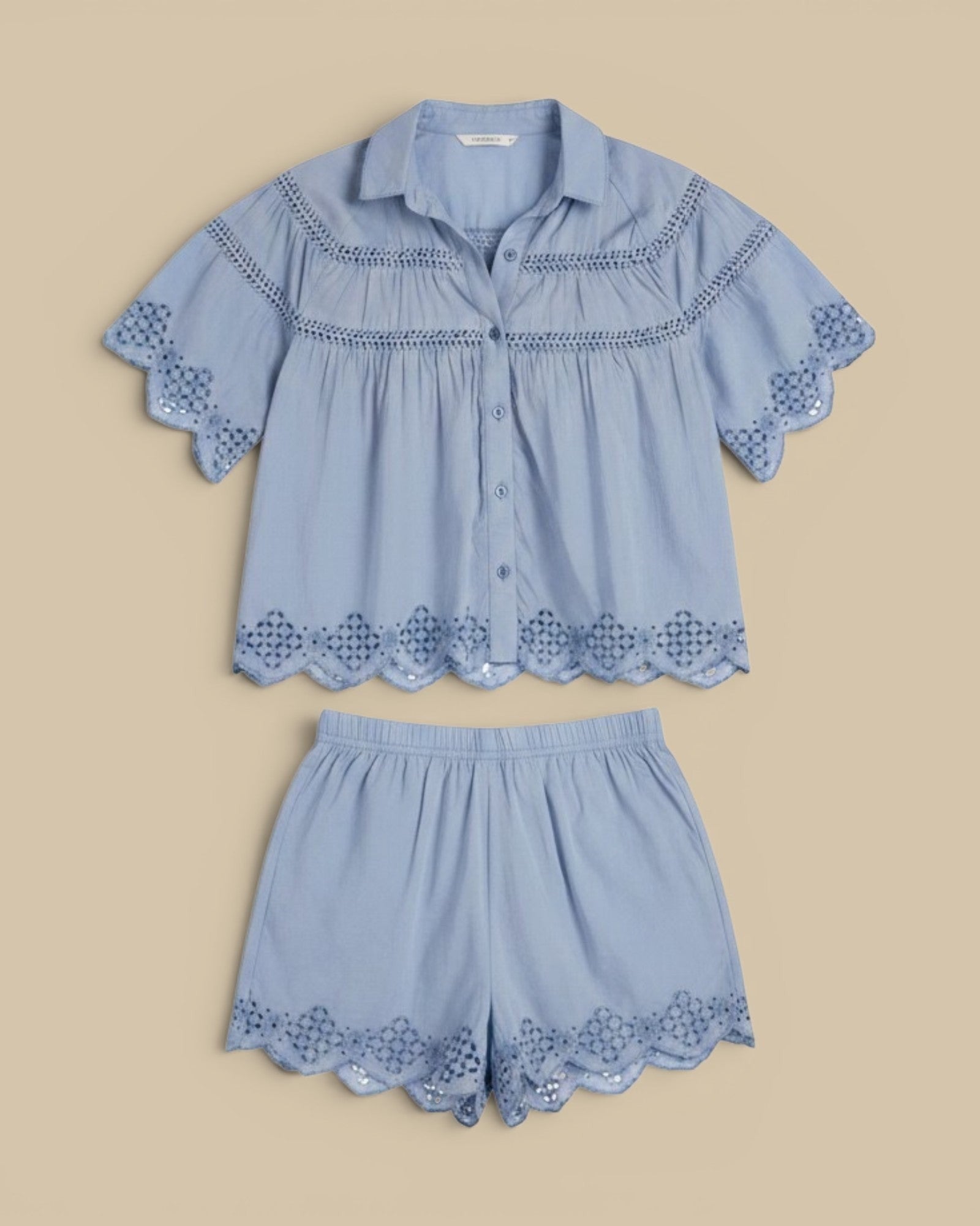 Homestyle Collective light blue cotton silk shorts with scalloped eyelet hem and elastic waistband.