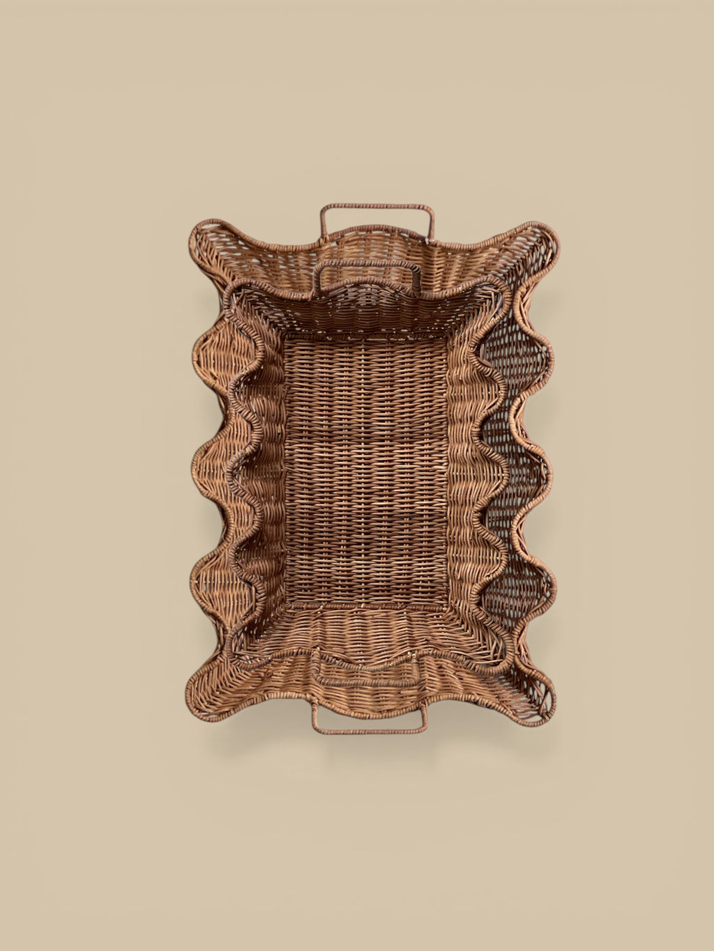Homestyle Collective set of 2 scalloped edge rattan nesting trays with handles, natural finish.