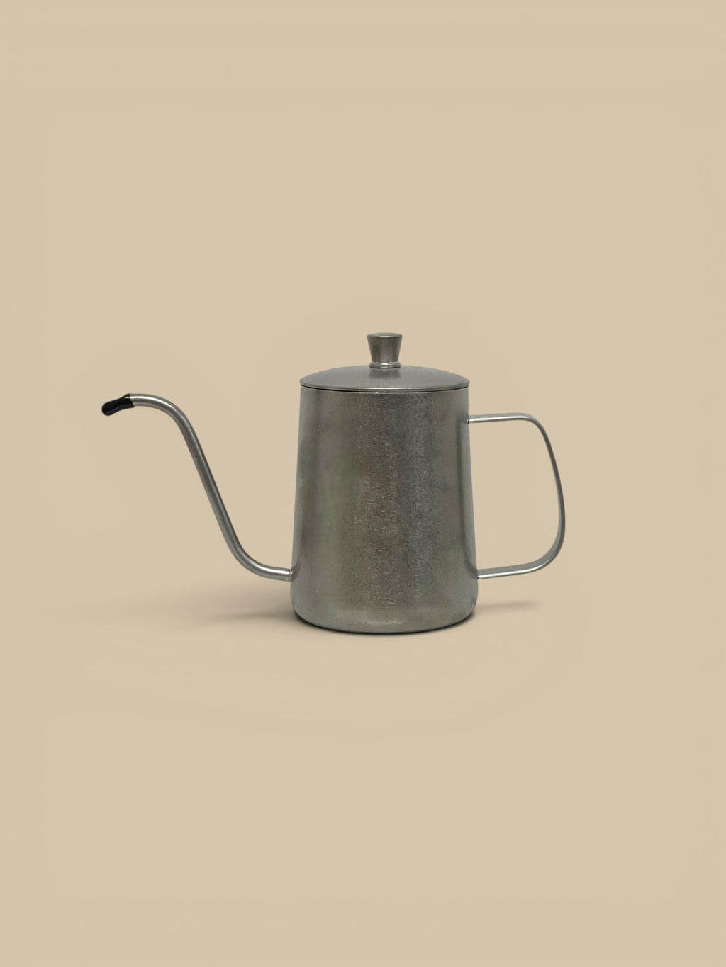Homestyle Collective stainless steel cruet with a gooseneck spout and lid, perfect for oils, vinegars, or syrups.