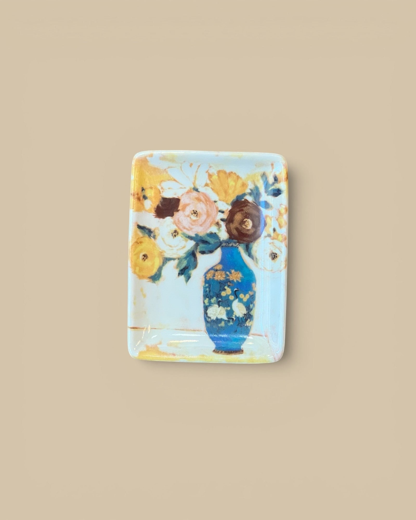 Homestyle Collective stoneware tray with a blue vase of colorful flowers painted in a still-life style.
