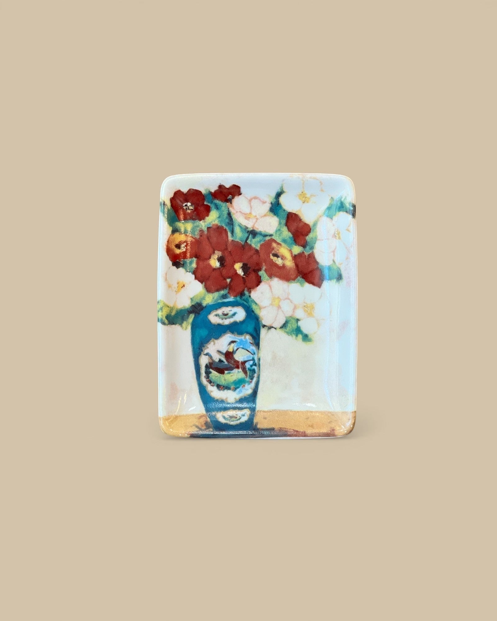 Homestyle Collective stoneware tray with a still-life painting of a blue vase filled with red and white flowers.