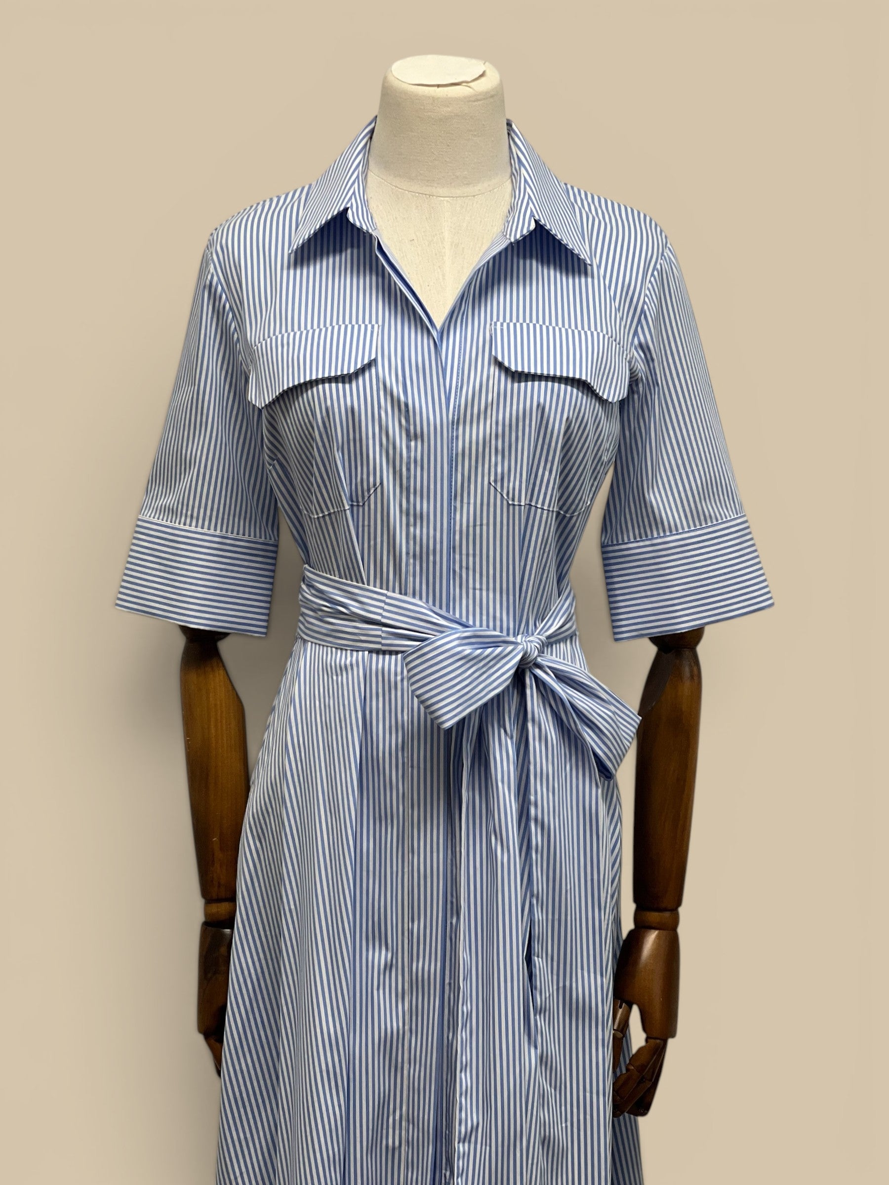 Homestyle Collective blue and white striped shirt dress with tie waist and chest pockets.