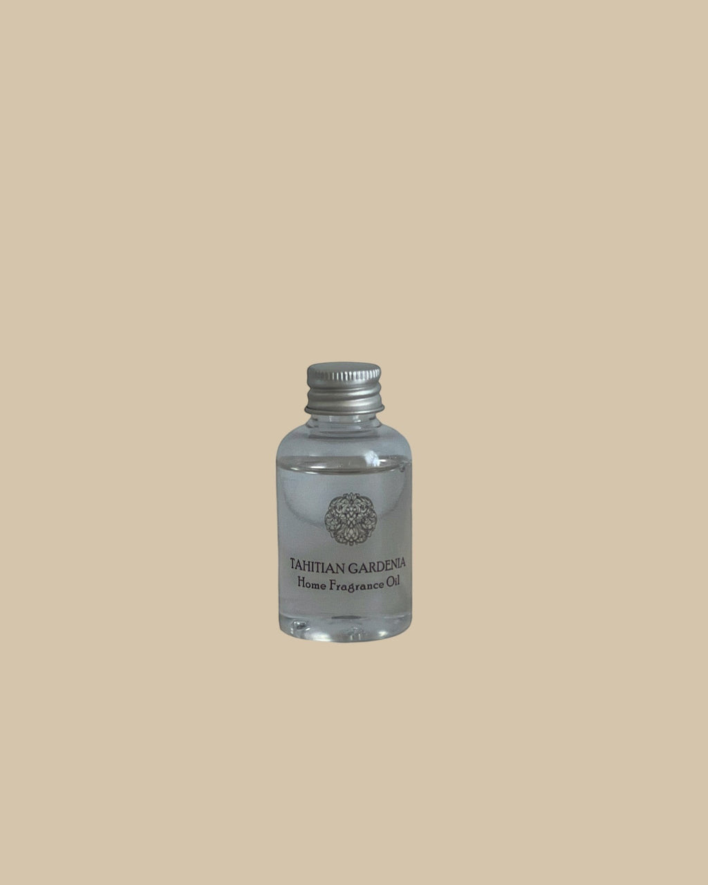 Homestyle Collective Grand Casablanca Tahitian Gardenia home fragrance oil in a clear glass bottle with silver cap.