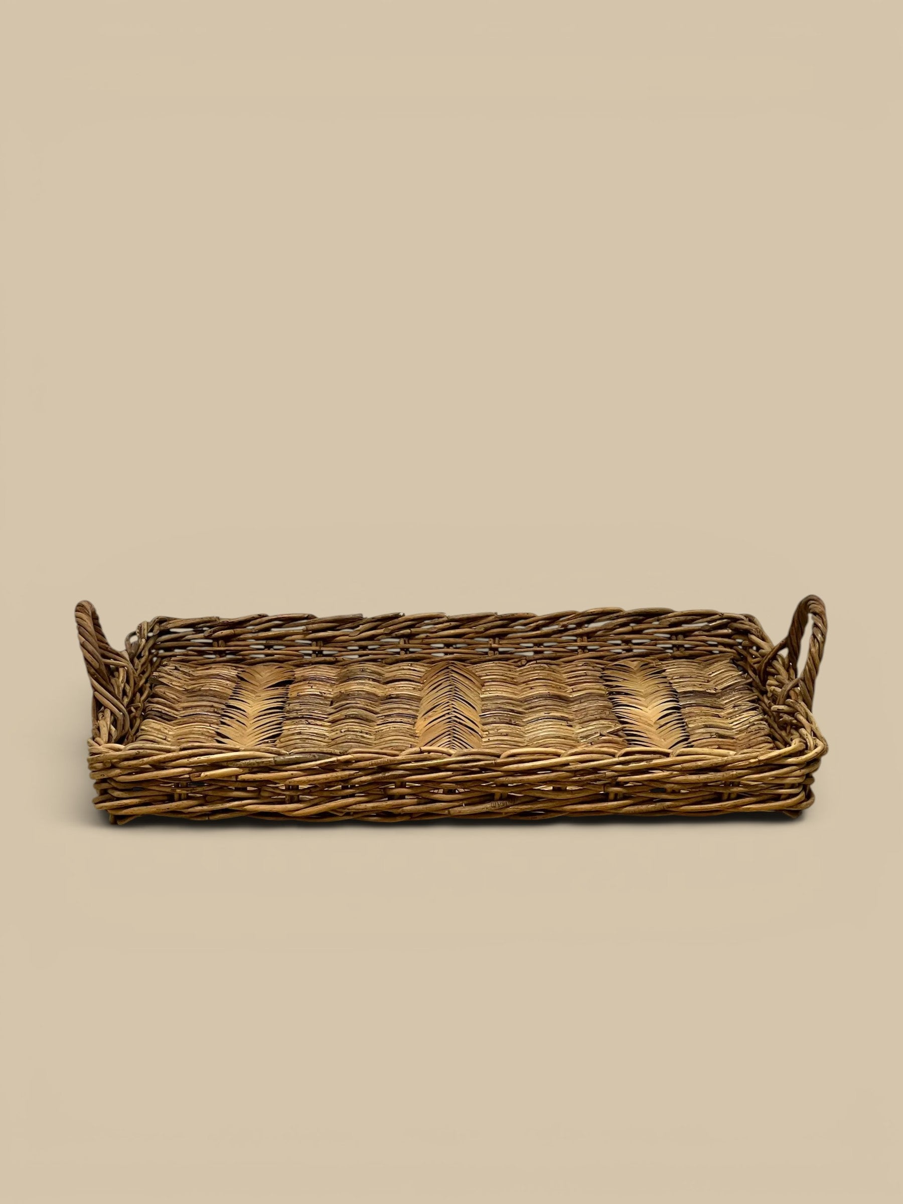 Homestyle Collective Valero Rattan Tray Set, natural woven herringbone pattern, rectangular with handles, set of 2